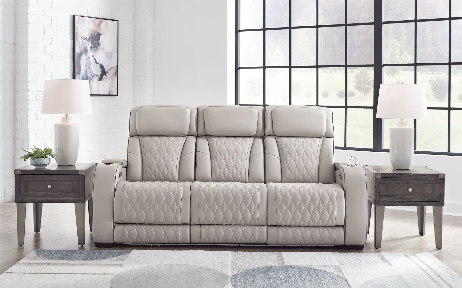 Signature Design by Ashley® Boyington - Power Reclining Sofa With Adj Headrest | Meri Furniture