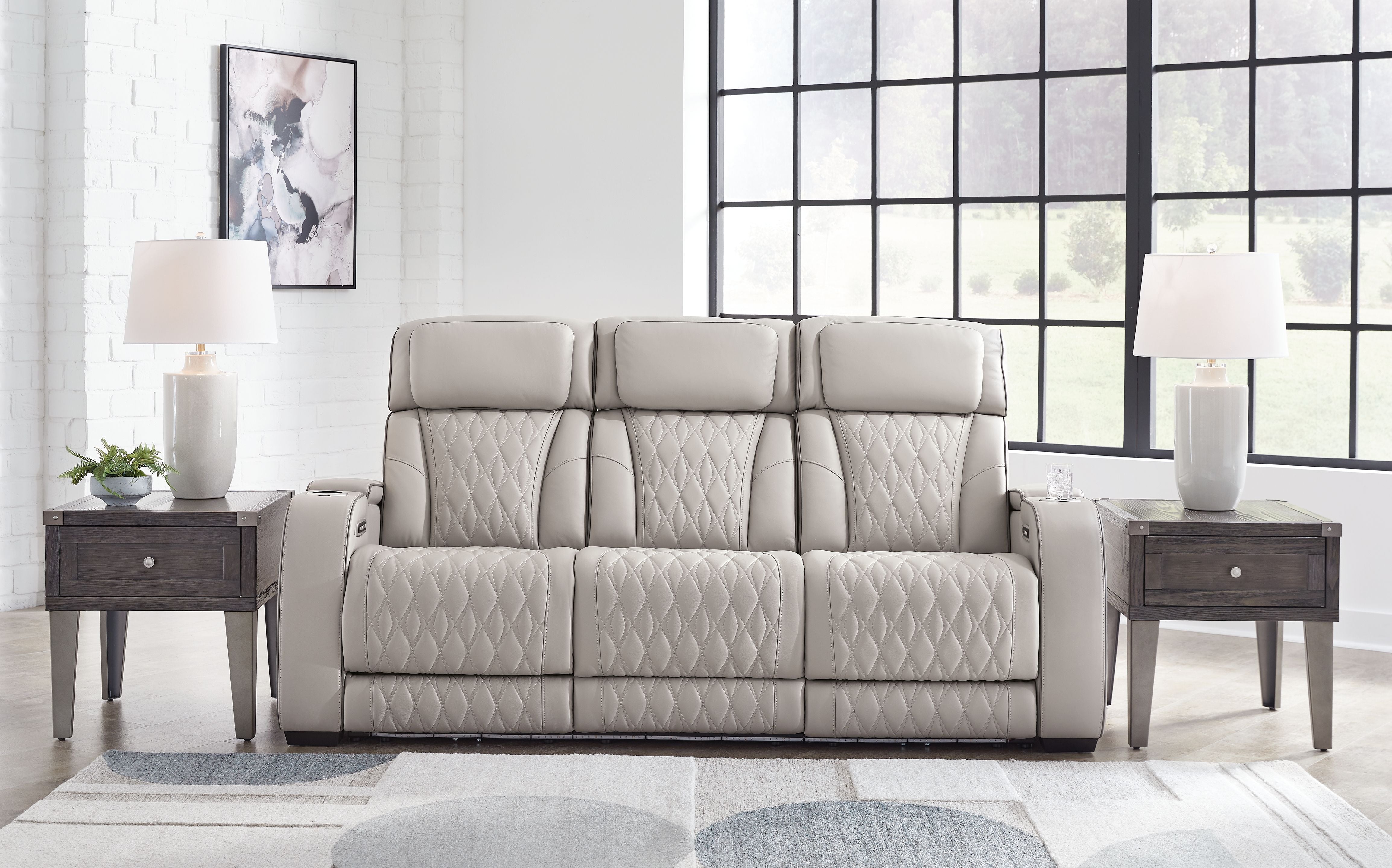 Signature Design by Ashley® Boyington - Power Reclining Sofa With Adj Headrest | Meri Furniture