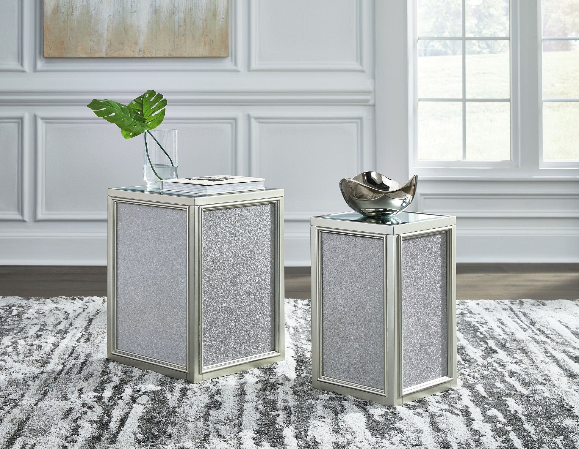 Signature Design by Ashley® Traleena - Silver Finish - Nesting End Tables (Set of 2) | Meri Furniture