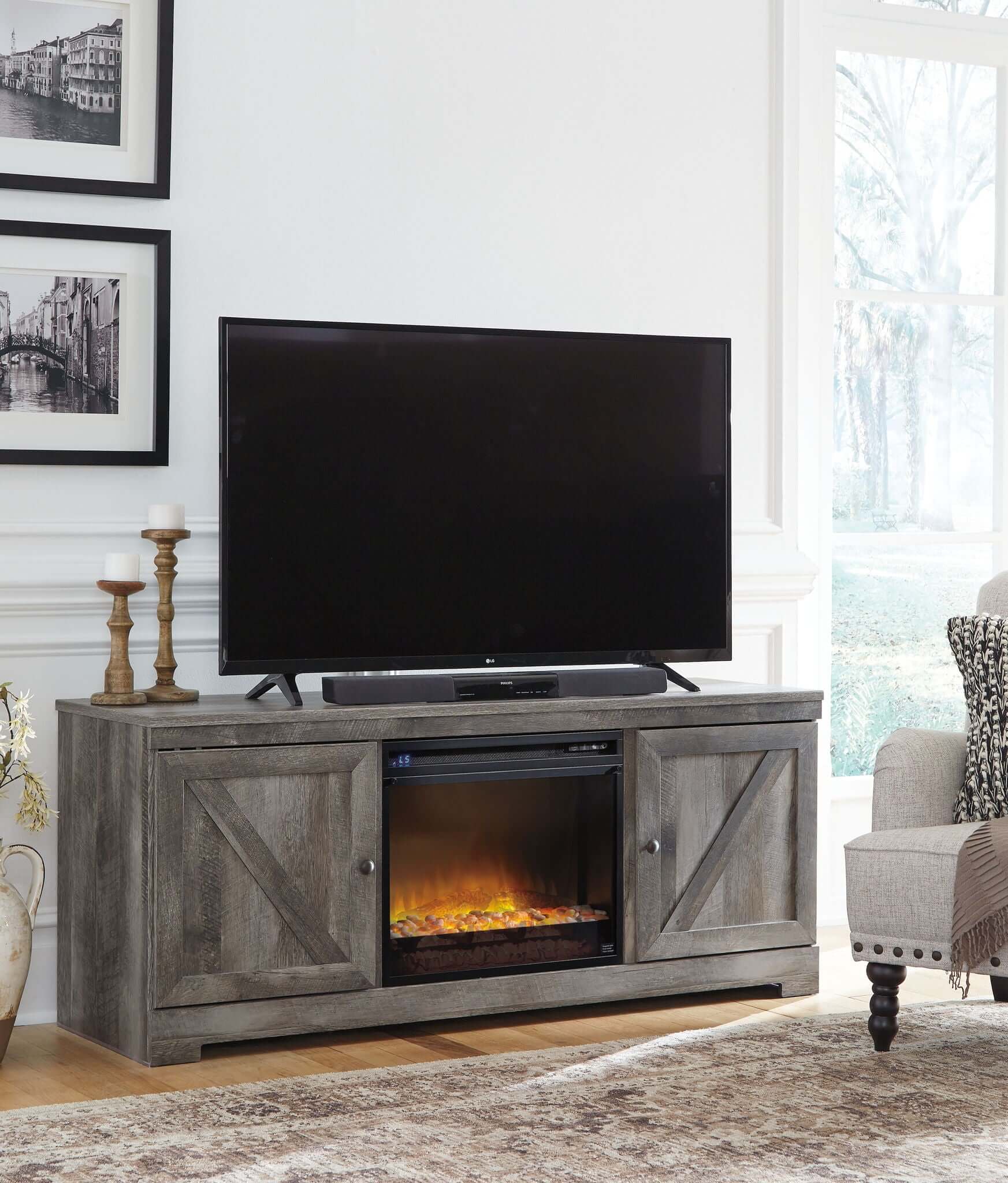 Wynnlow - 63" TV Stand With Glass/Stone Fireplace Insert - Gray