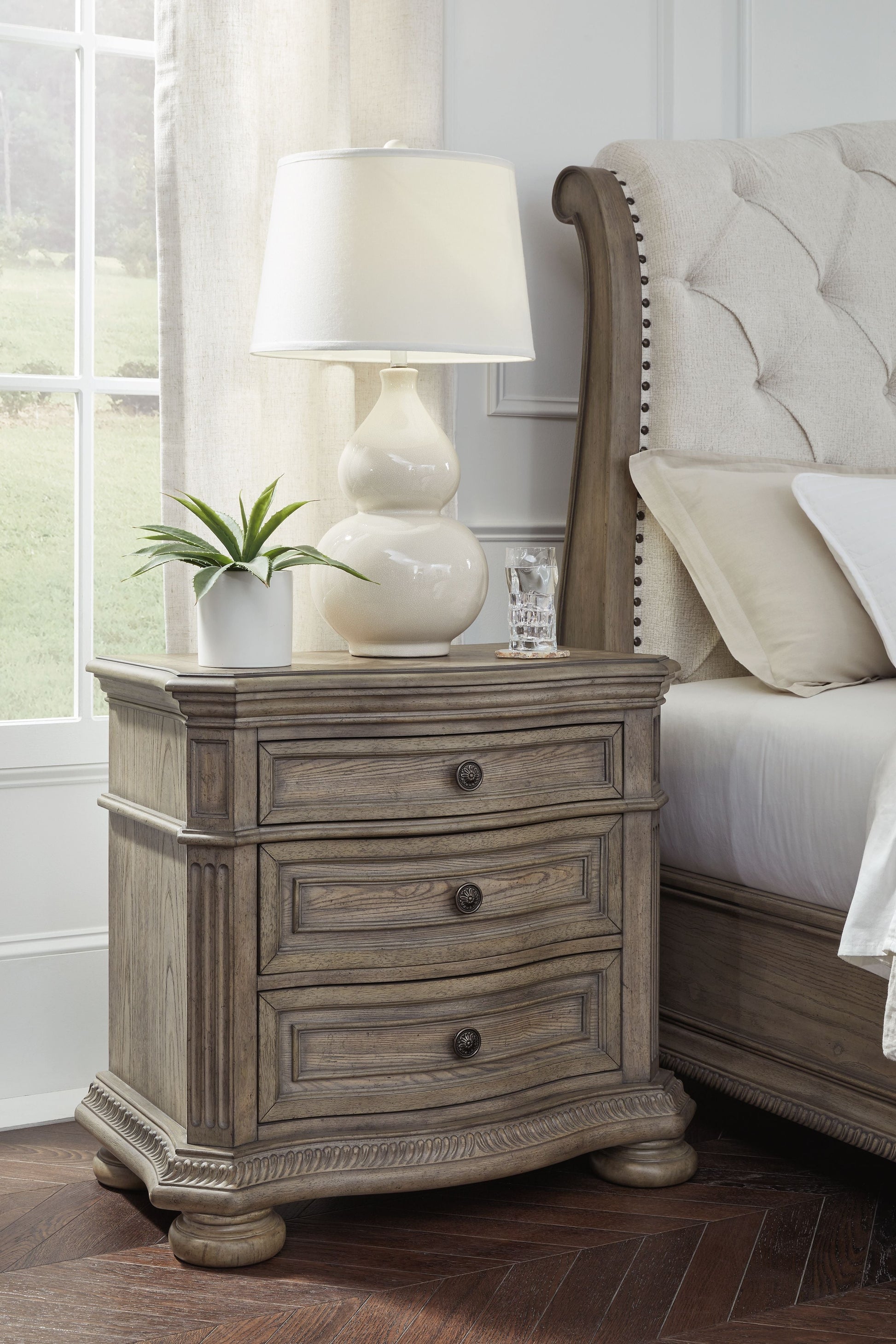 Signature Design by Ashley® Ardenfield - Light Brown - Three Drawer Night Stand | Meri Furniture