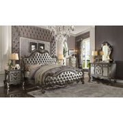 ACME Turn your bedroom into a classy abode with this sophisticated Versailles II bed in a vintage PU. The curved wood trim on the headboard and footboard is accentuated with a fluted seashell motif crown. | Meri Furniture