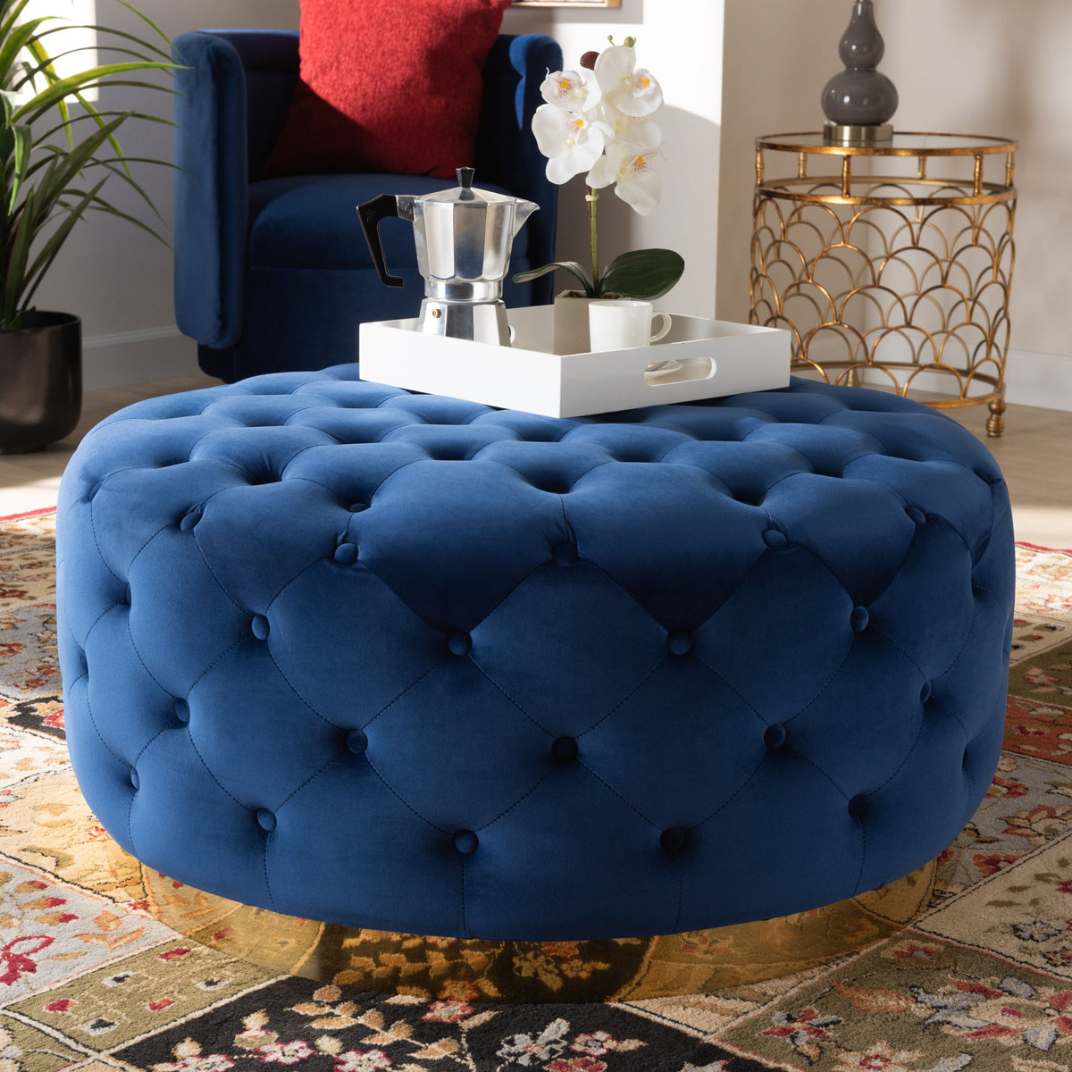 Sasha Glam and Luxe Royal Blue Velvet Fabric Upholstered Gold Finished Round Cocktail Ottoman