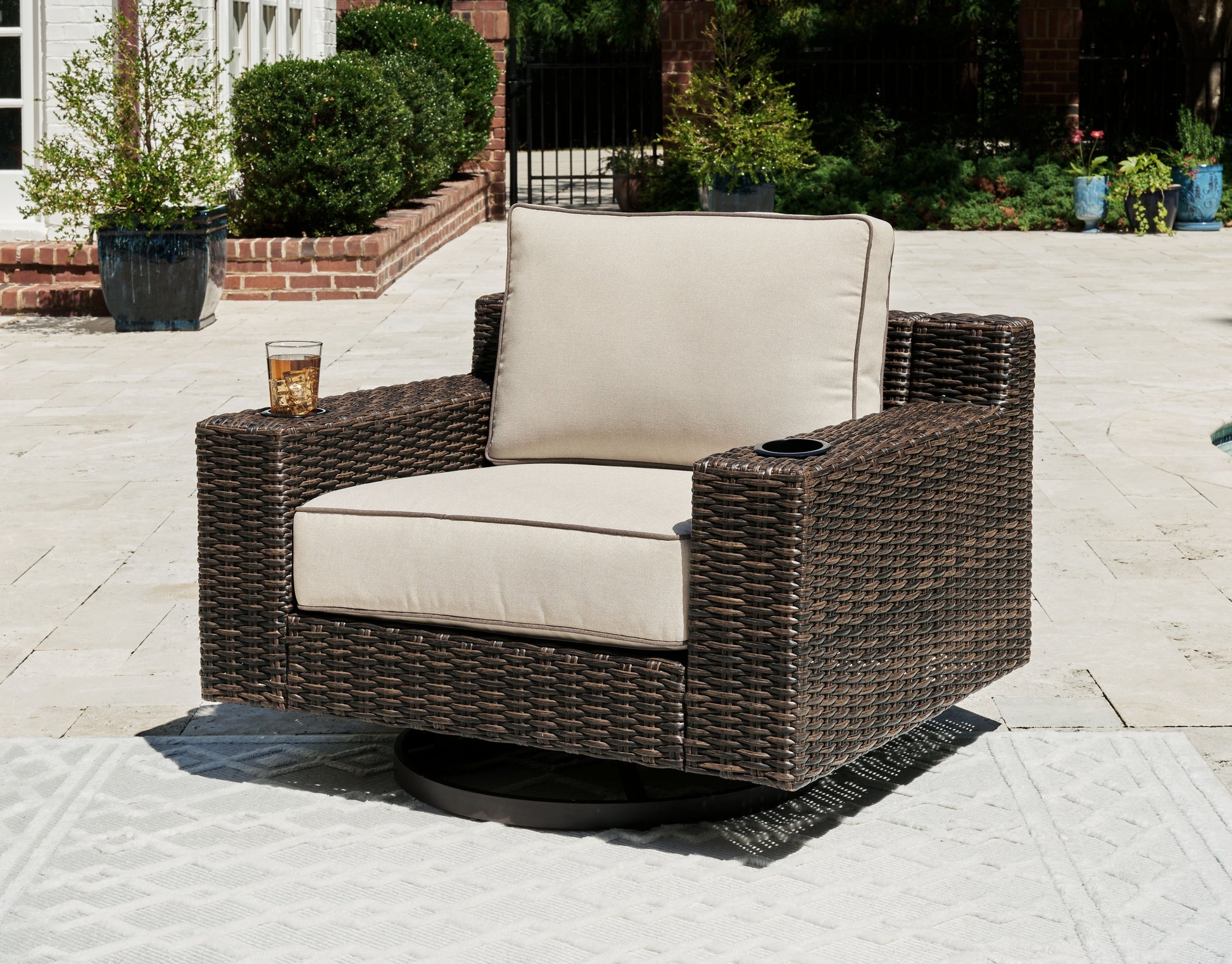Signature Design by Ashley® Coastline Bay - Brown - Swivel Lounge W/ Cushion | Meri Furniture
