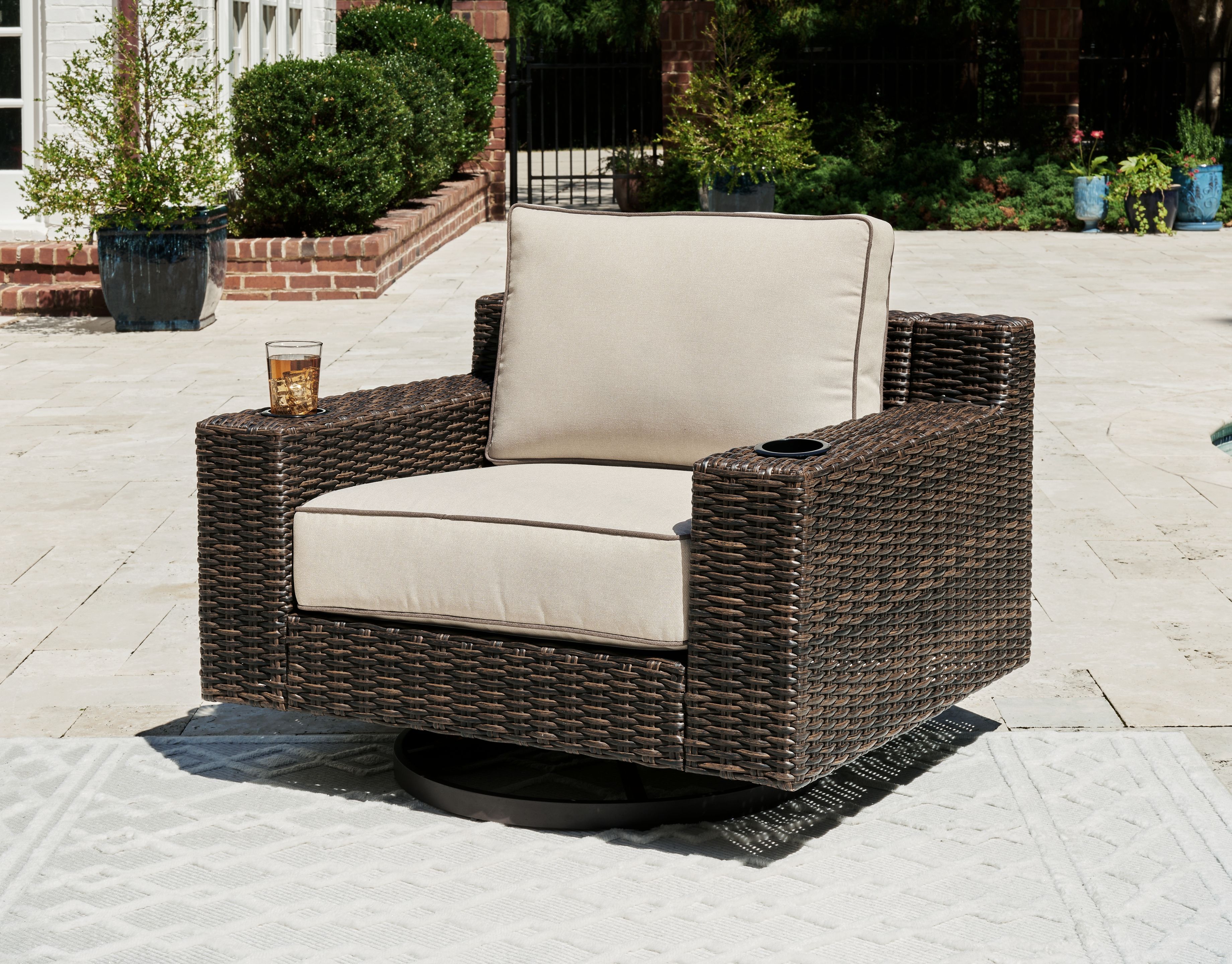 Signature Design by Ashley® Coastline Bay - Brown - Swivel Lounge W/ Cushion | Meri Furniture