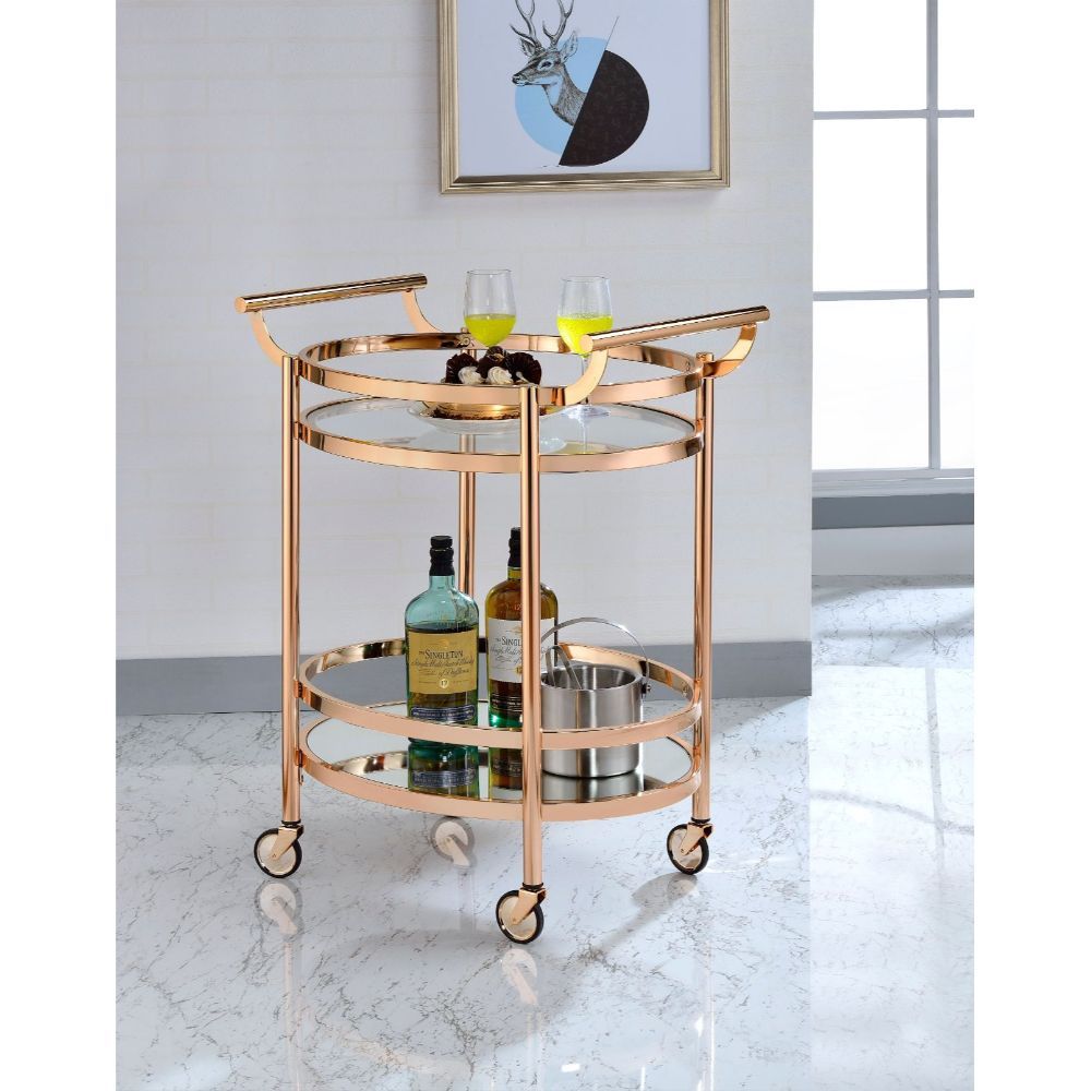 Show off your personality with the Lakelyn serving cart. The clear tempered glass top and mirror bottom are the ideal place for placing your dishes and dining accessories. Roll it where need be on its softer rubber wheels and prepare to entertain.