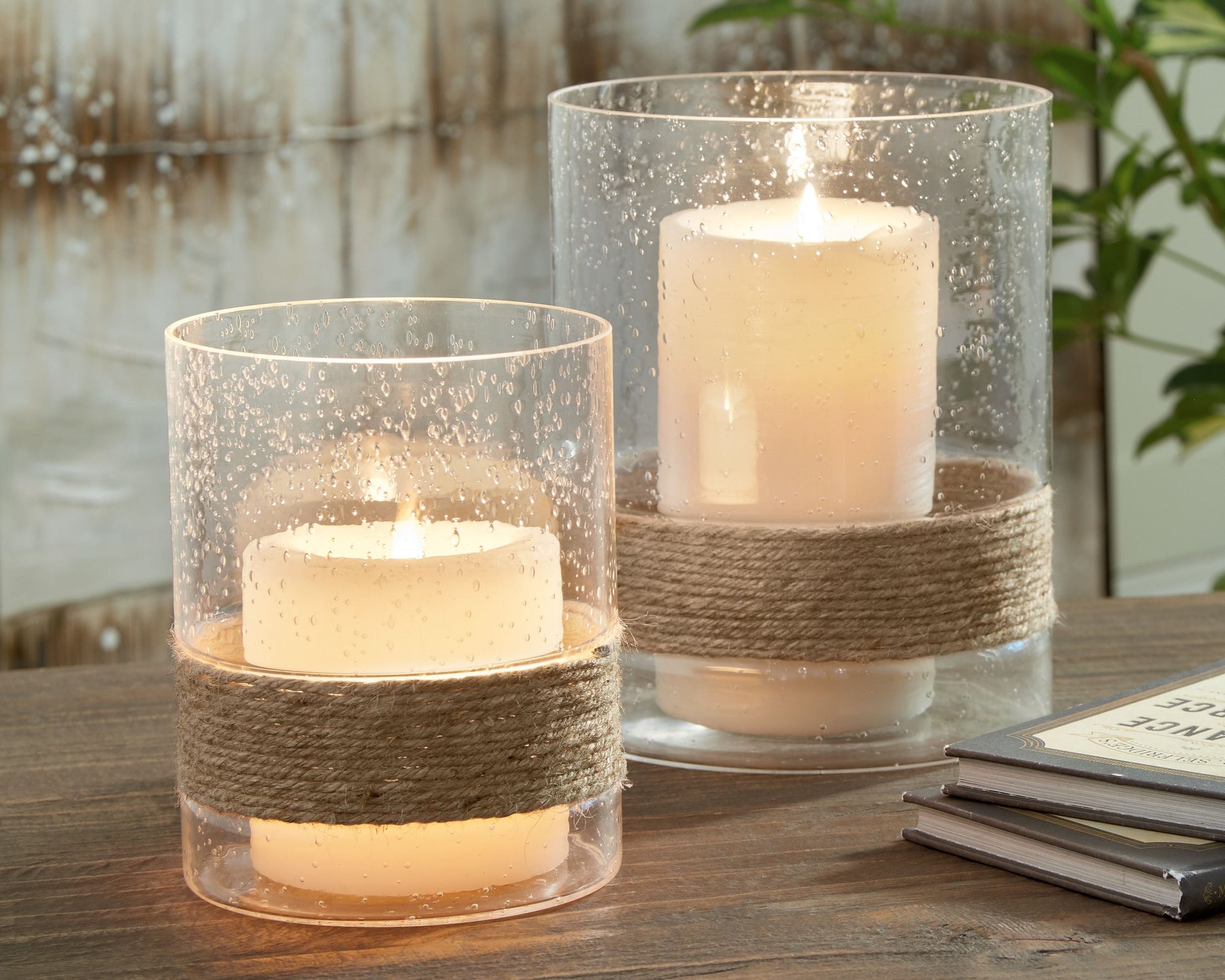 Ashley Furniture Eudocia - Clear - Candle Holder Set (Set of 2) | Meri Furniture