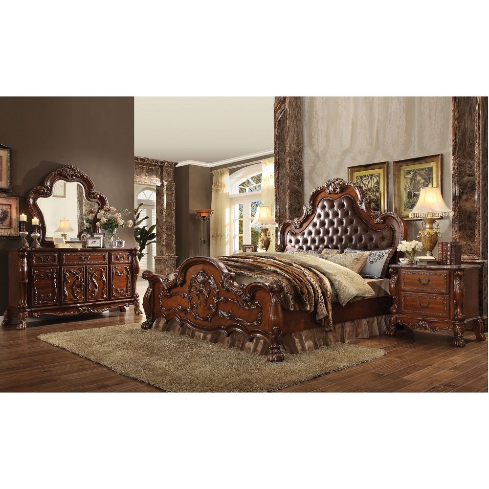 ACME The Dresden Nightstand offers beautiful craftsmanship and artistic carvings. It features solid hardwood with two drawers for storage with coordinating carvings. The drawers feature dove tail construction and are decorated with antique brass hardware.