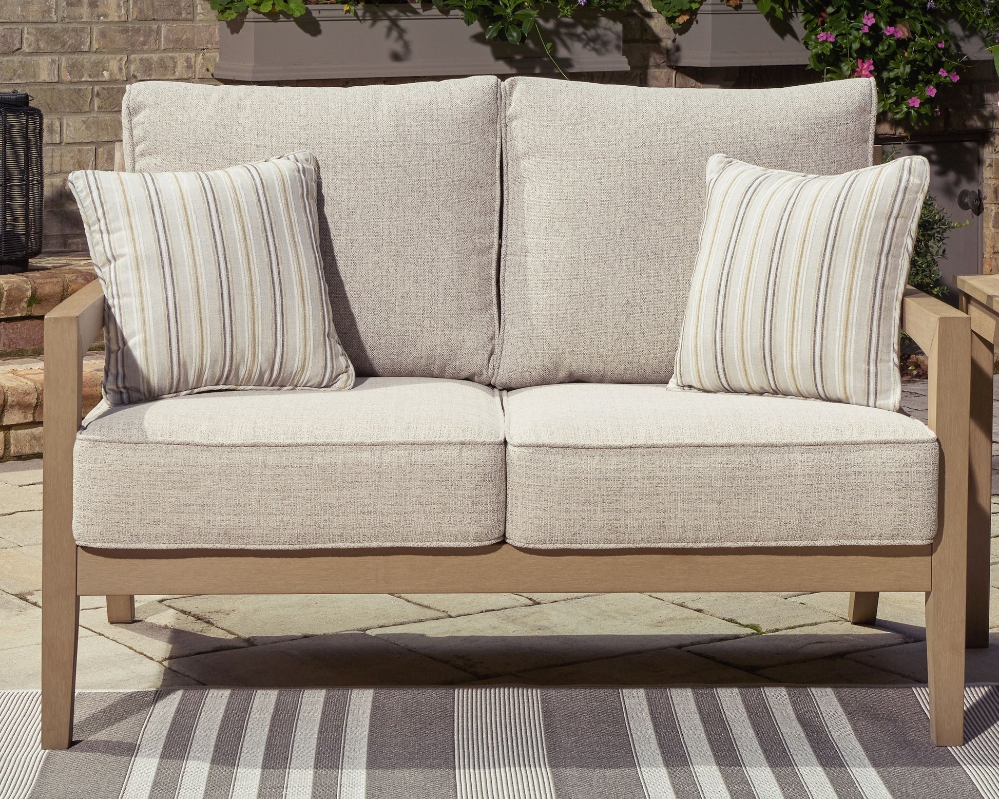 Signature Design by Ashley® Hallow Creek - Driftwood - Loveseat With Cushion | Meri Furniture