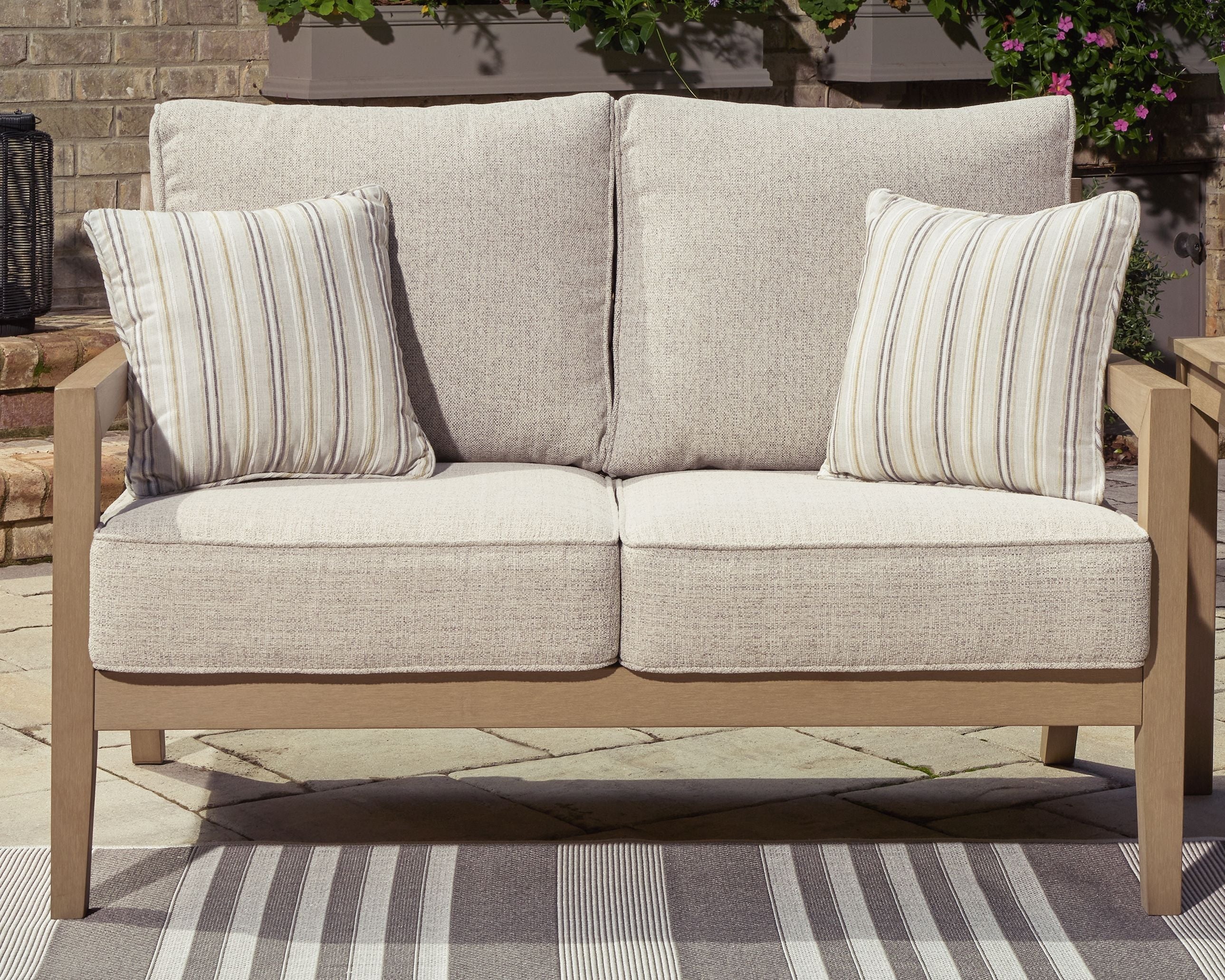 Signature Design by Ashley® Hallow Creek - Driftwood - Loveseat With Cushion | Meri Furniture