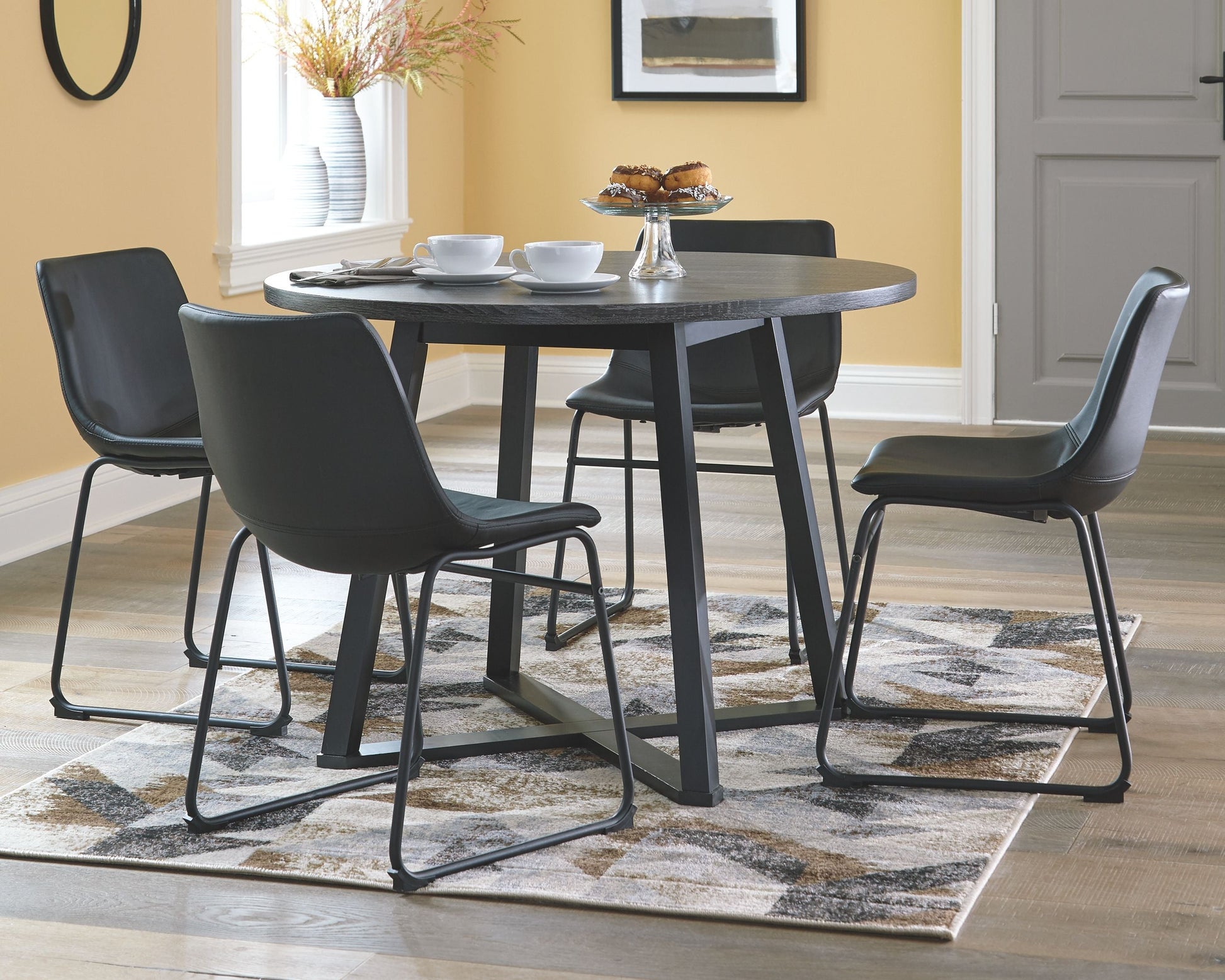 Signature Design by Ashley® Centiar - Black / Gray - Round Dining Room Table | Meri Furniture
