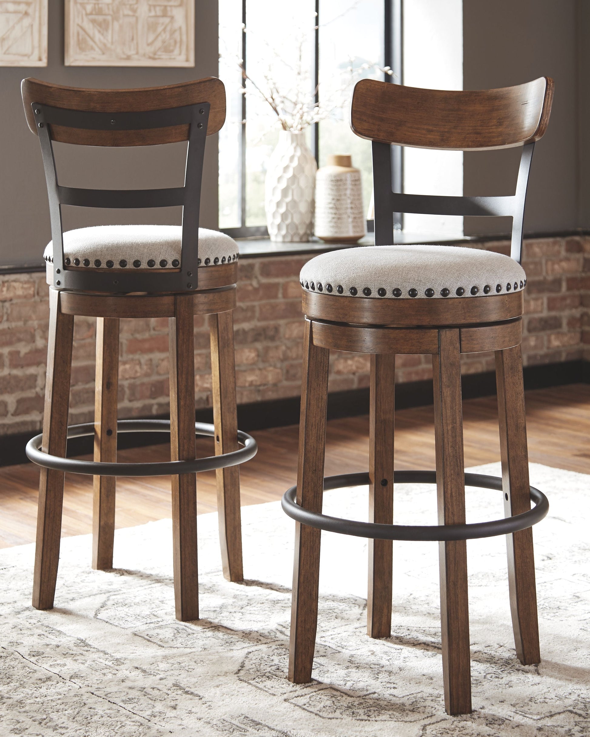 Signature Design by Ashley® Valebeck - Tall Upholstered Swivel Barstool | Meri Furniture