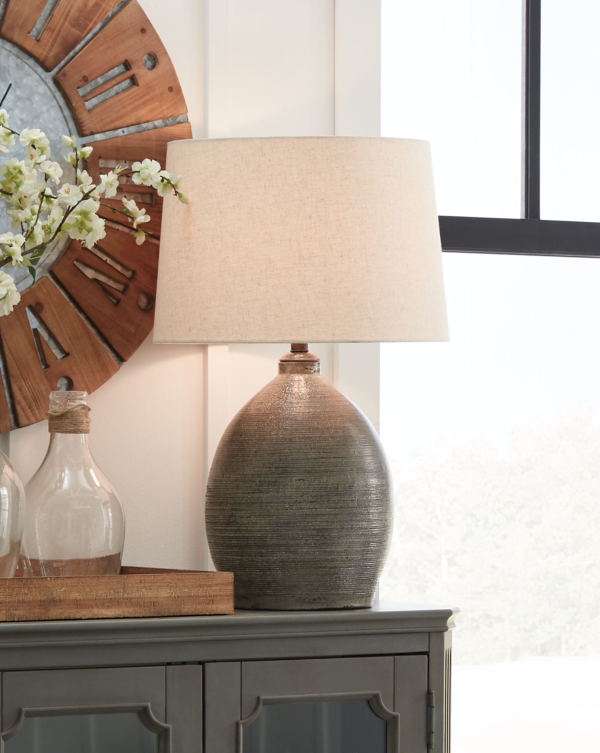 Ashley Furniture Joyelle - Gray - Terracotta Table Lamp | Meri Furniture