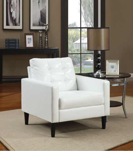 The Balin Upholstered accent chair features strong lines and tufted cushions. The faux leather upholstery is available in Espresso or White Finish. Change your seating and style game with this one piece.