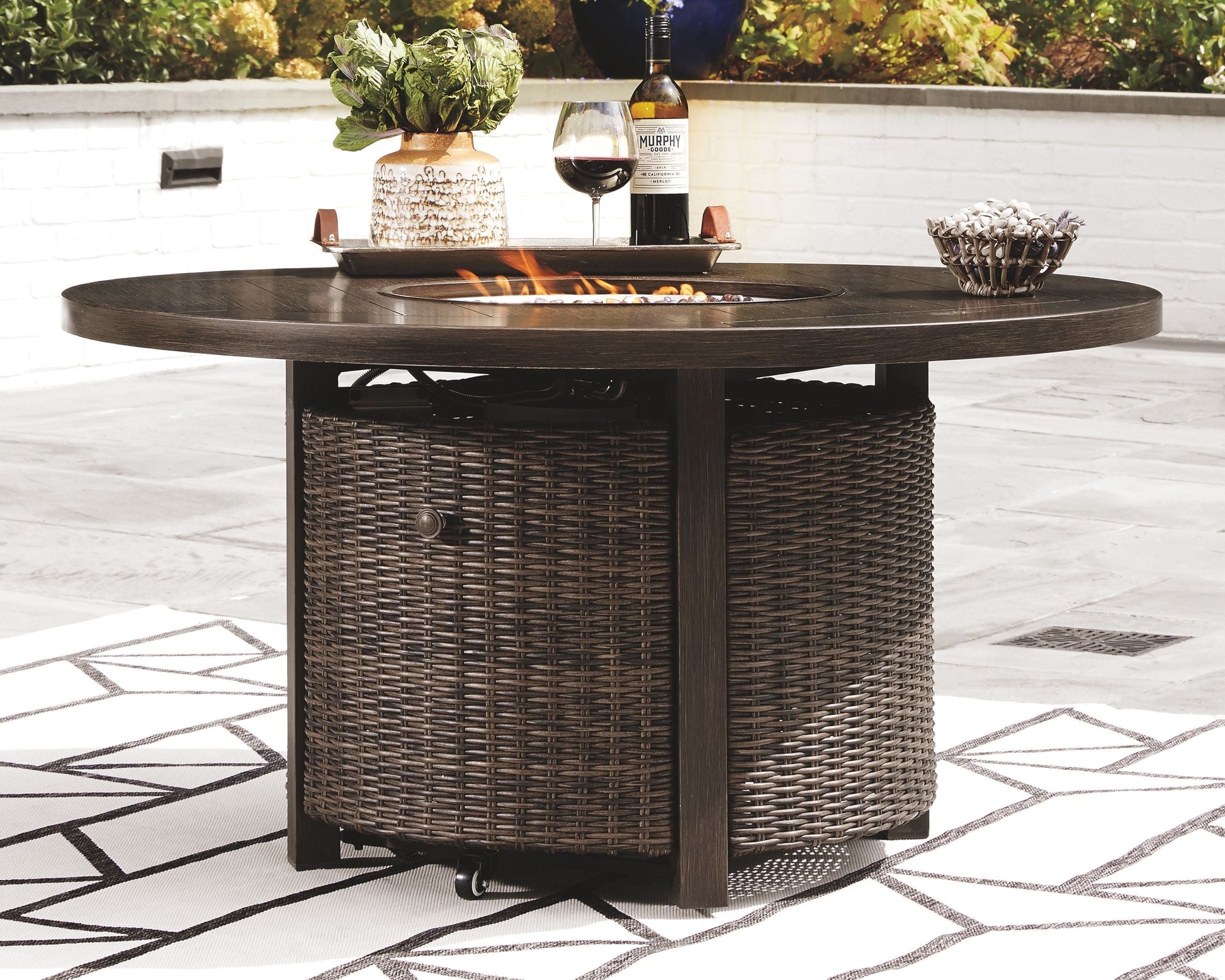 Ashley Furniture Paradise - Medium Brown - Round Fire Pit Table | Meri Furniture