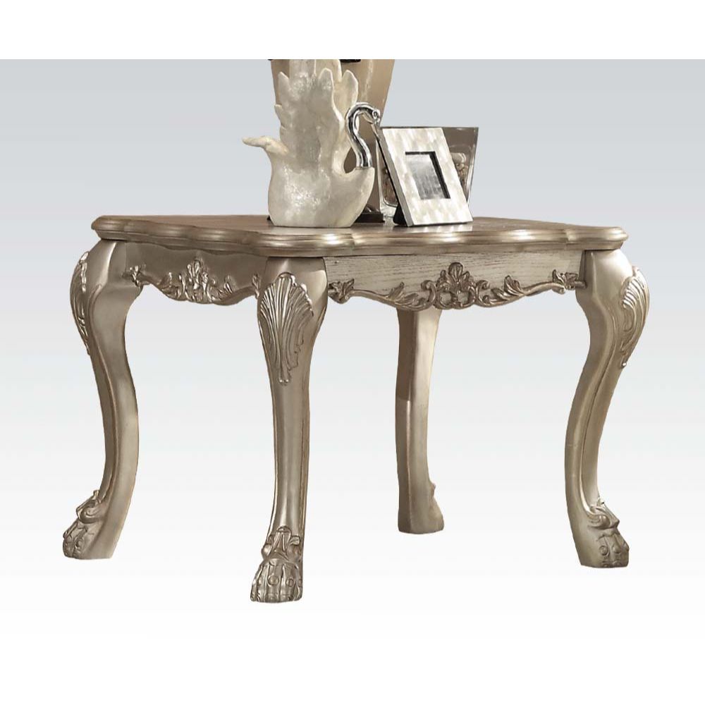 The Dresden traditional end table, reflects highly decorative details, oversized claw feet, decorative carving inlay veneers on apron, all carefully made with selected materials. This table will be the showpiece of any room environment.