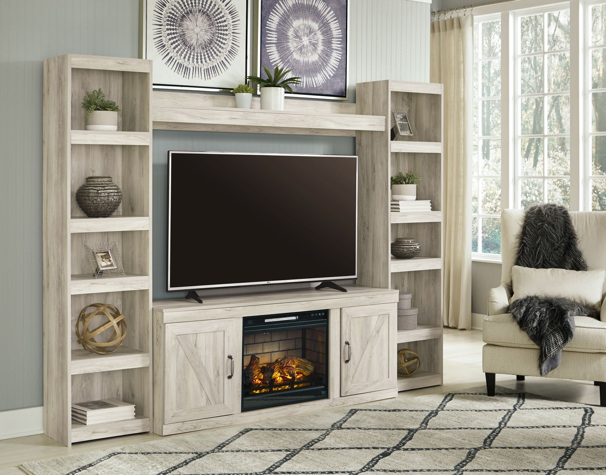 Signature Design by Ashley® Bellaby - Entertainment Center | Meri Furniture