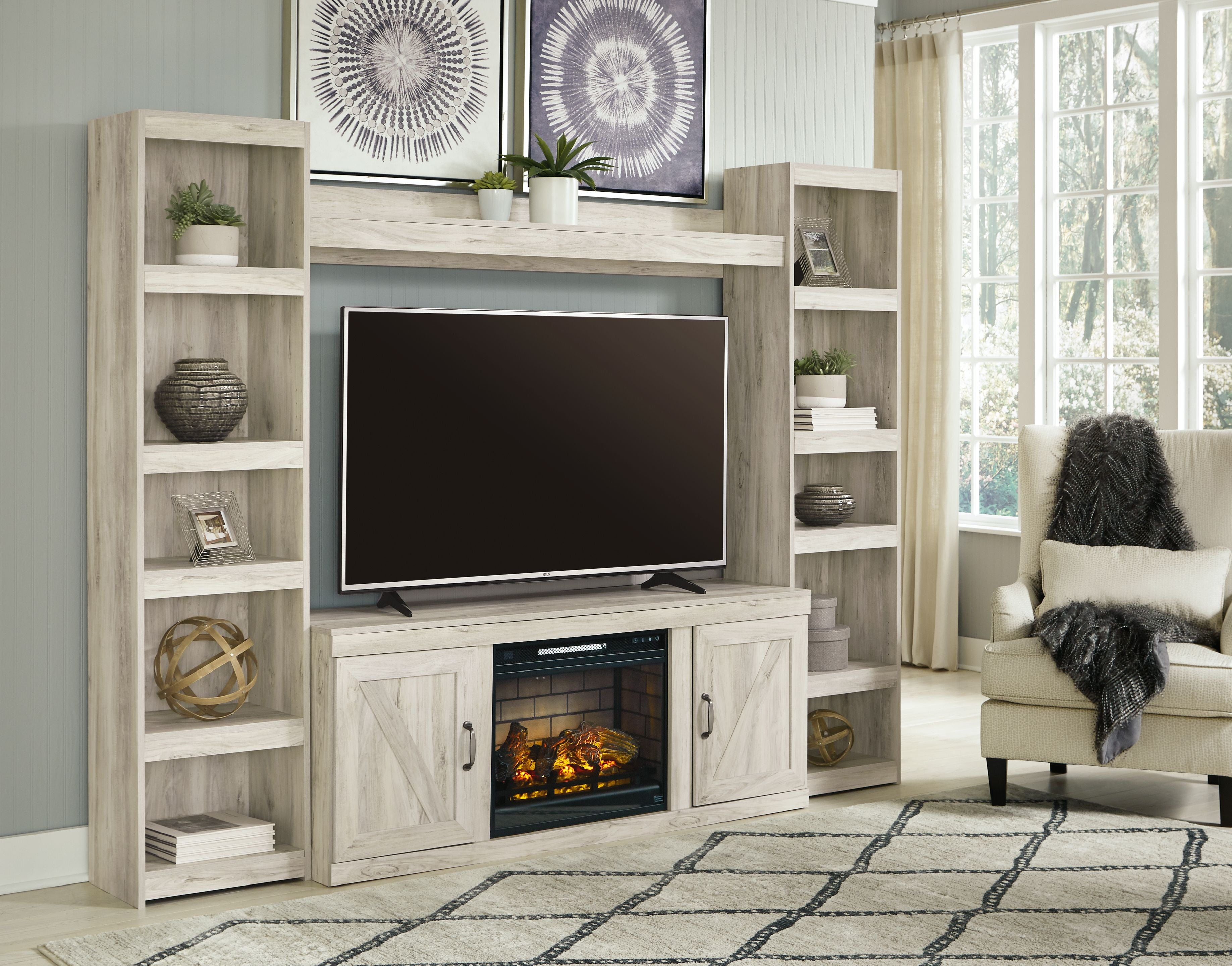 Signature Design by Ashley® Bellaby - Entertainment Center | Meri Furniture