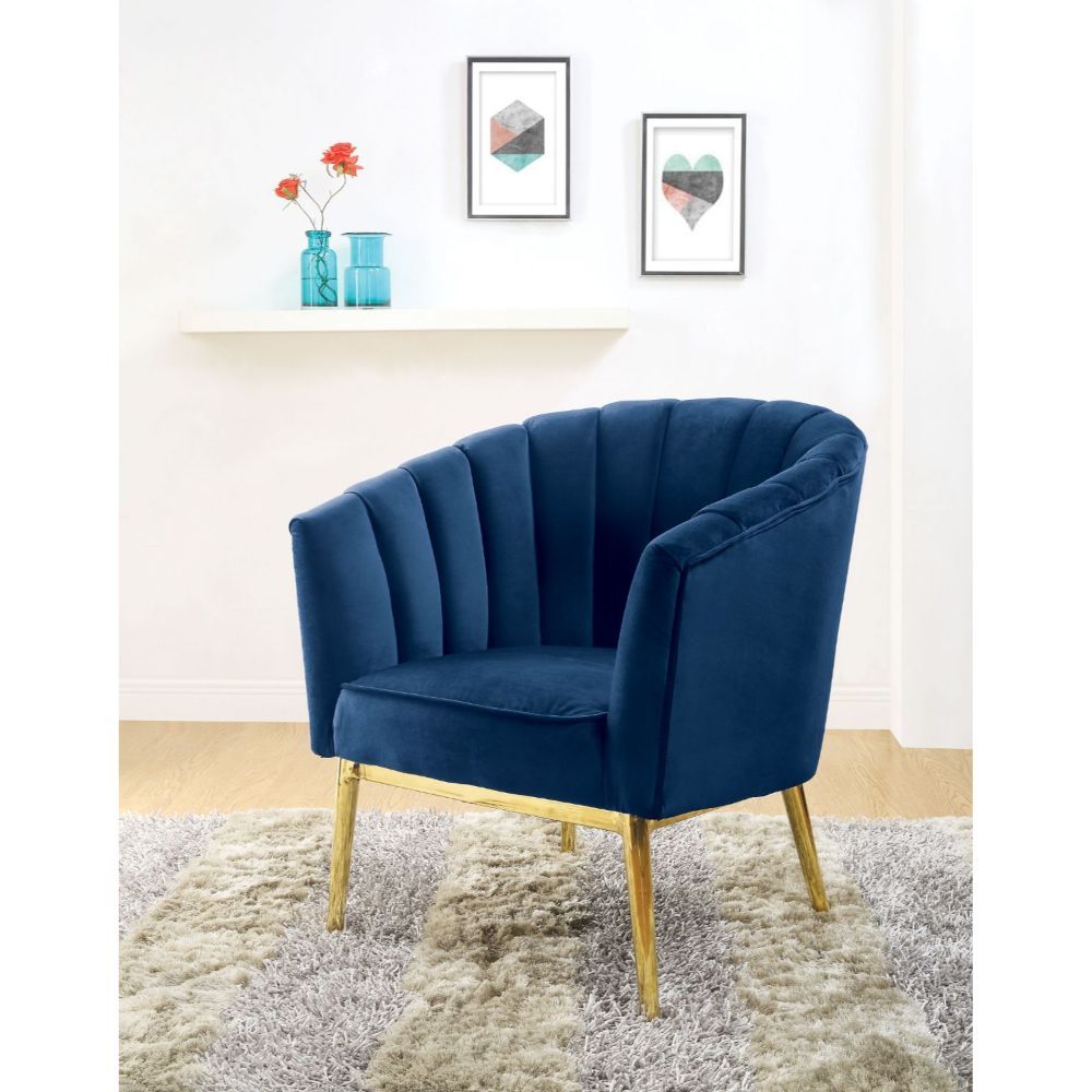 ACME Refined carving with authentic styling, the Colla accent chair is the embodiment of elegance. The thick padded velvet cushion with straight-lined detailing offers superior coziness. | Meri Furniture