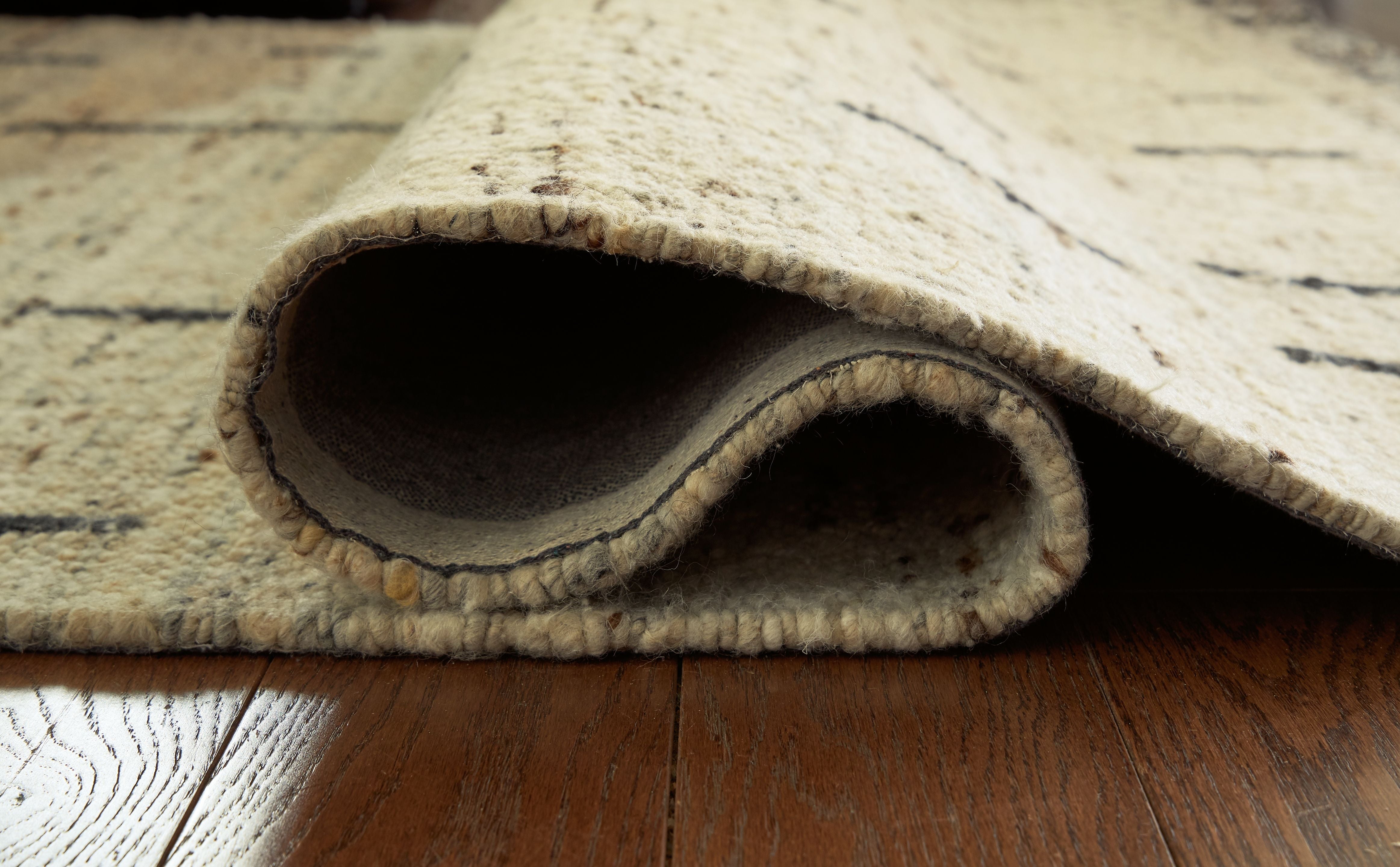 Signature Design by Ashley® Mortis - Area Rug | Meri Furniture