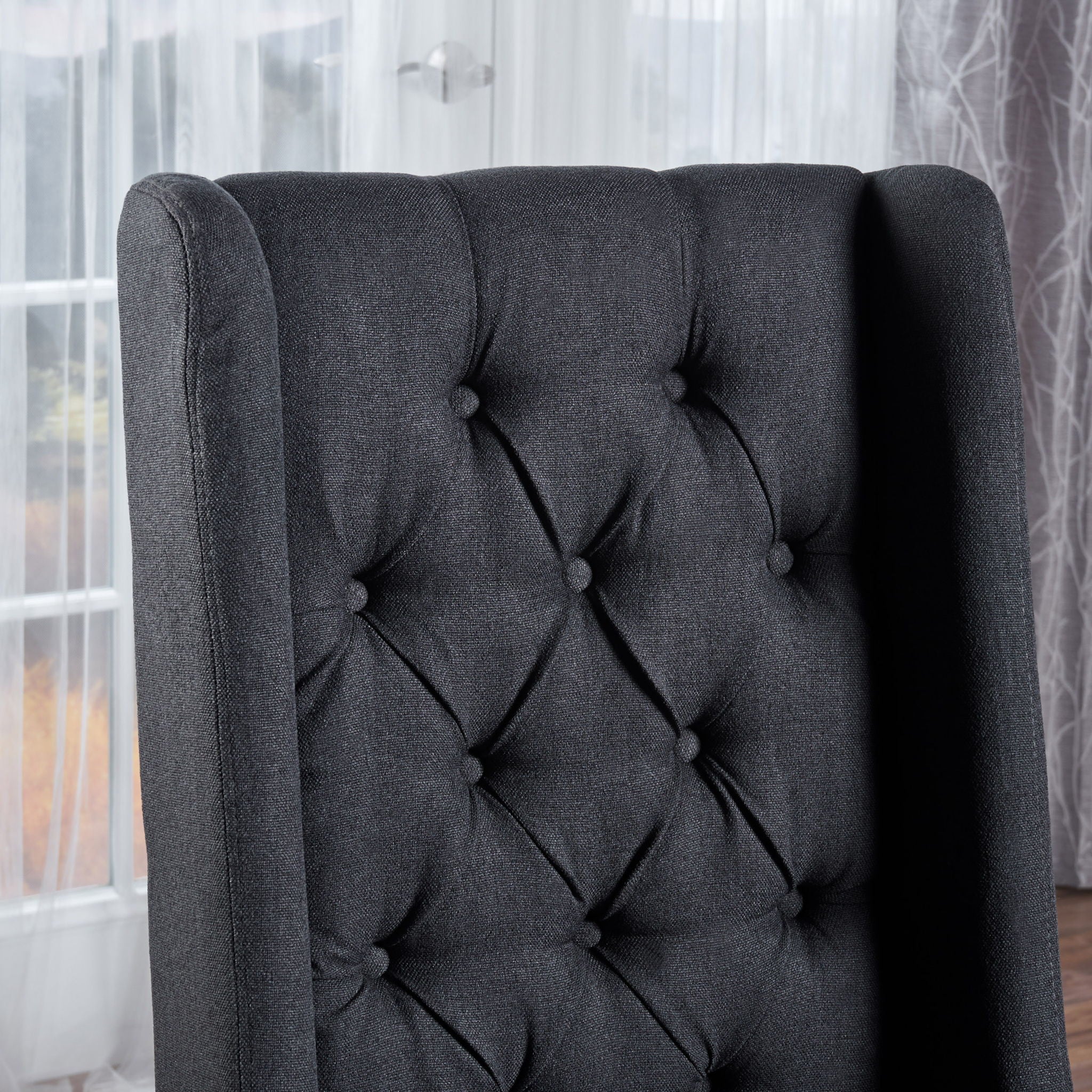 Sophisticated Tufted Dining Chair With High Back Design