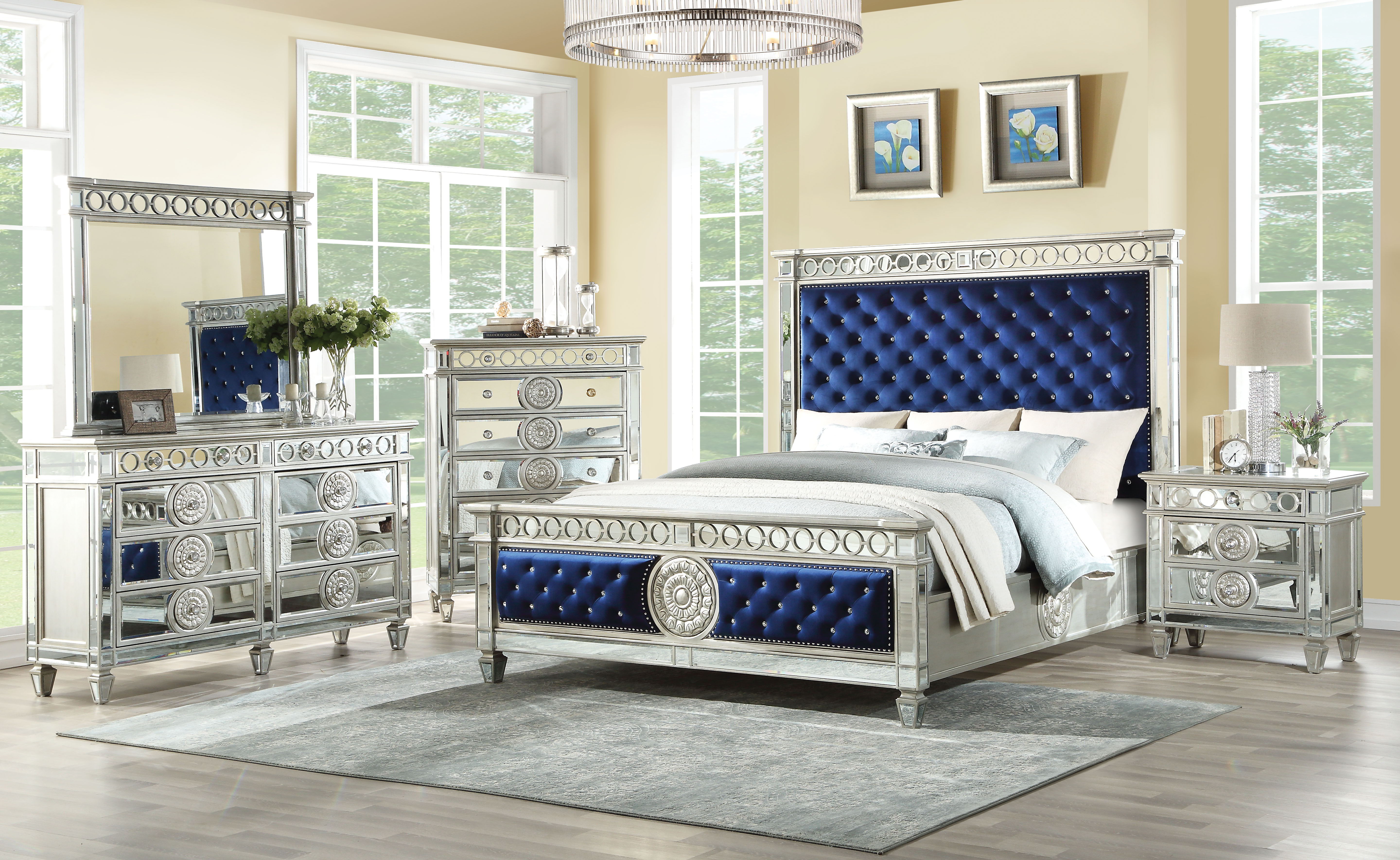 ACME The Varian bed provides a commanding presence in any room. This contemporary panel bed features a padded rectangular headboard and low profile footboard in luxurious upholstery with elegantly tapered legs. | Meri Furniture