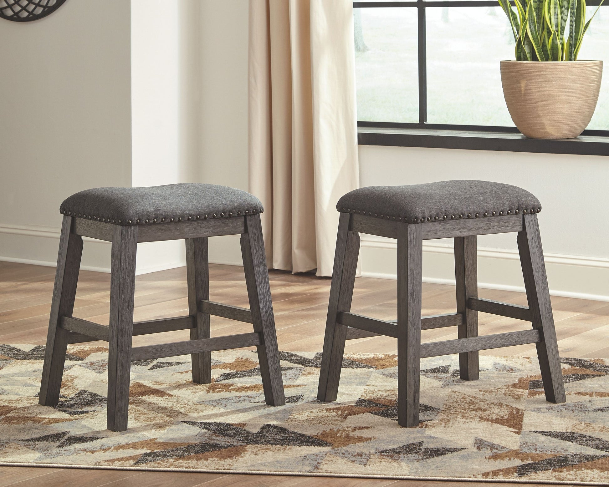 Signature Design by Ashley® Caitbrook - Gray - Upholstered Stool (Set of 2) | Meri Furniture