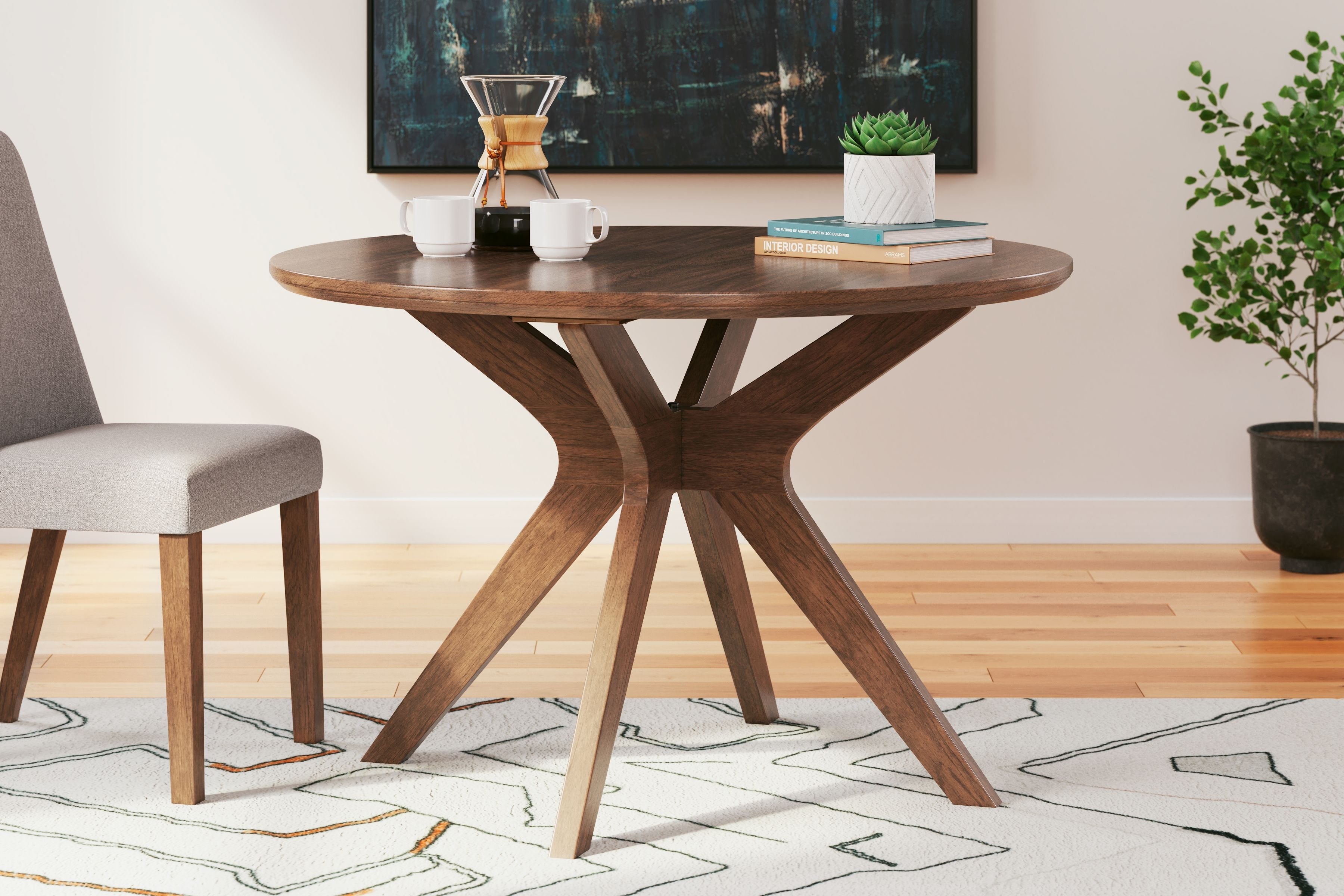 Signature Design by Ashley® Lyncott - Brown - Round Dining Room Table | Meri Furniture