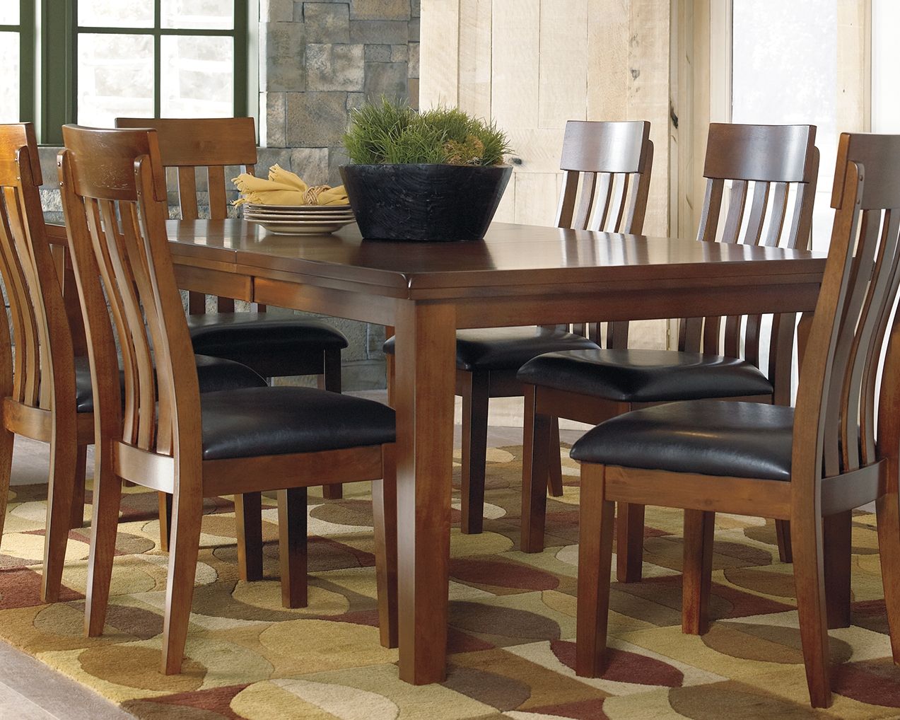 Signature Design by Ashley® Ralene - Medium Brown - Rectangular Dining Room Butterfly Extension Table | Meri Furniture
