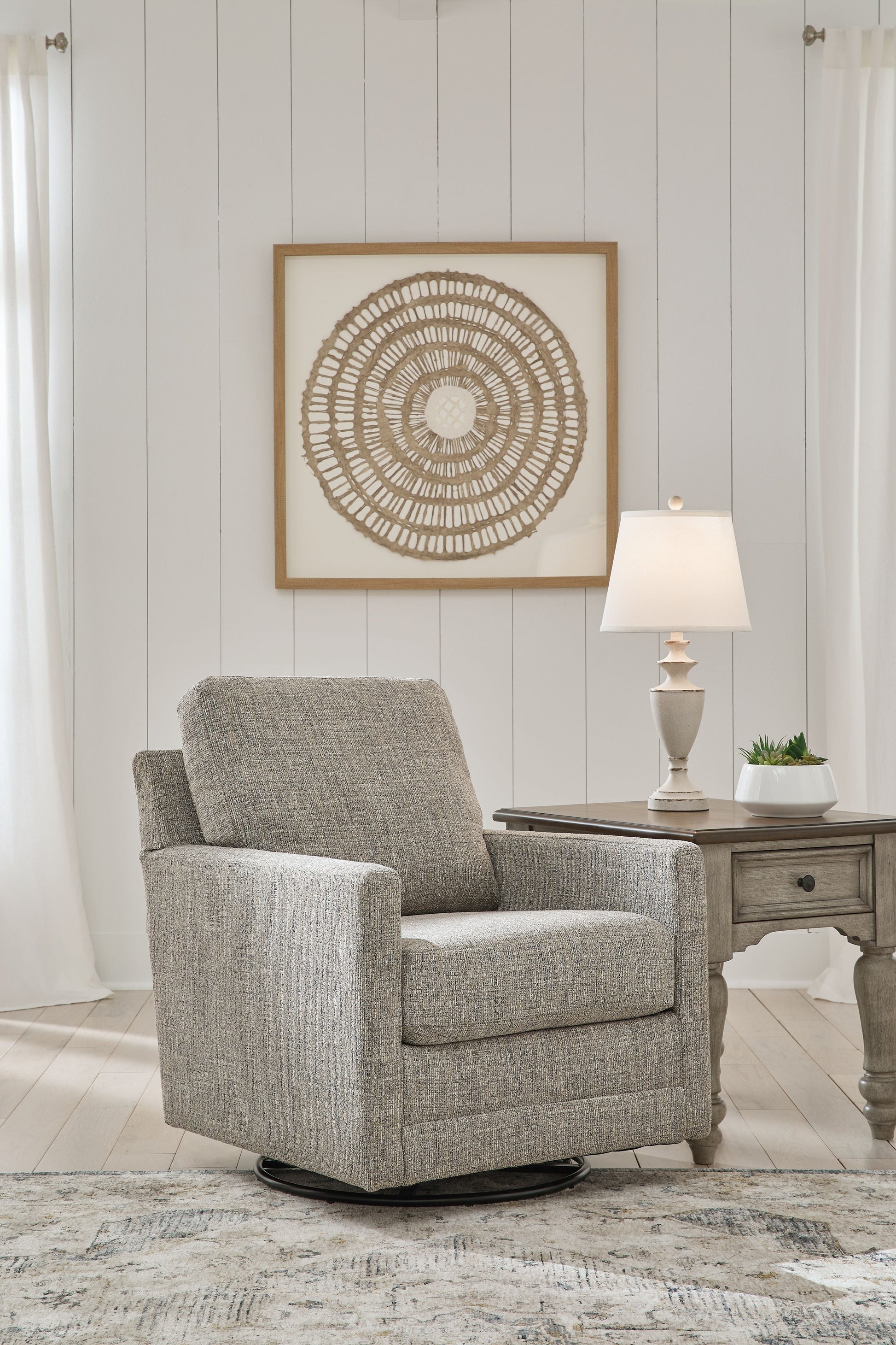 Ashley® Bralynn - Linen - Swivel Glider Accent Chair | Meri Furniture