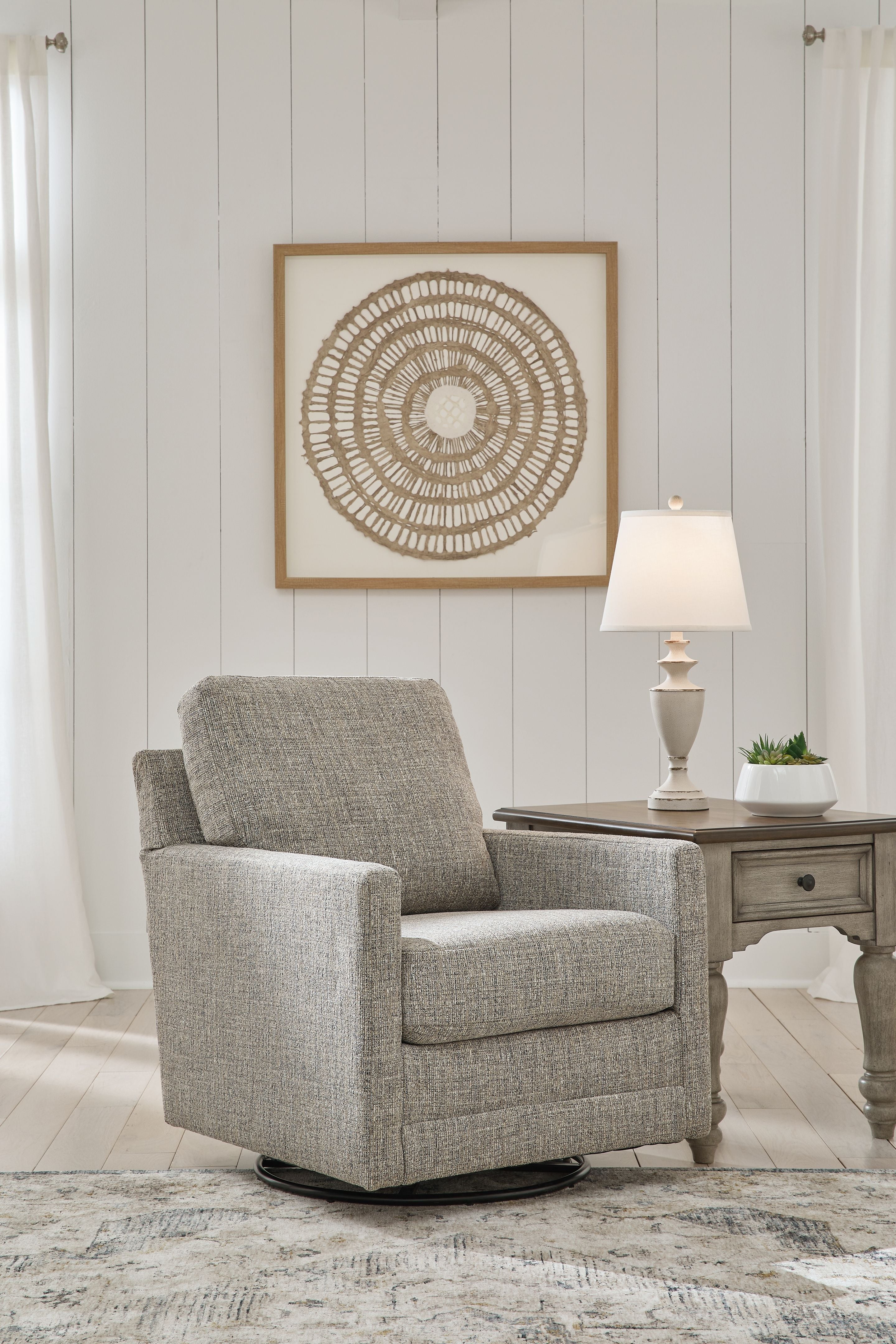 Ashley® Bralynn - Linen - Swivel Glider Accent Chair | Meri Furniture