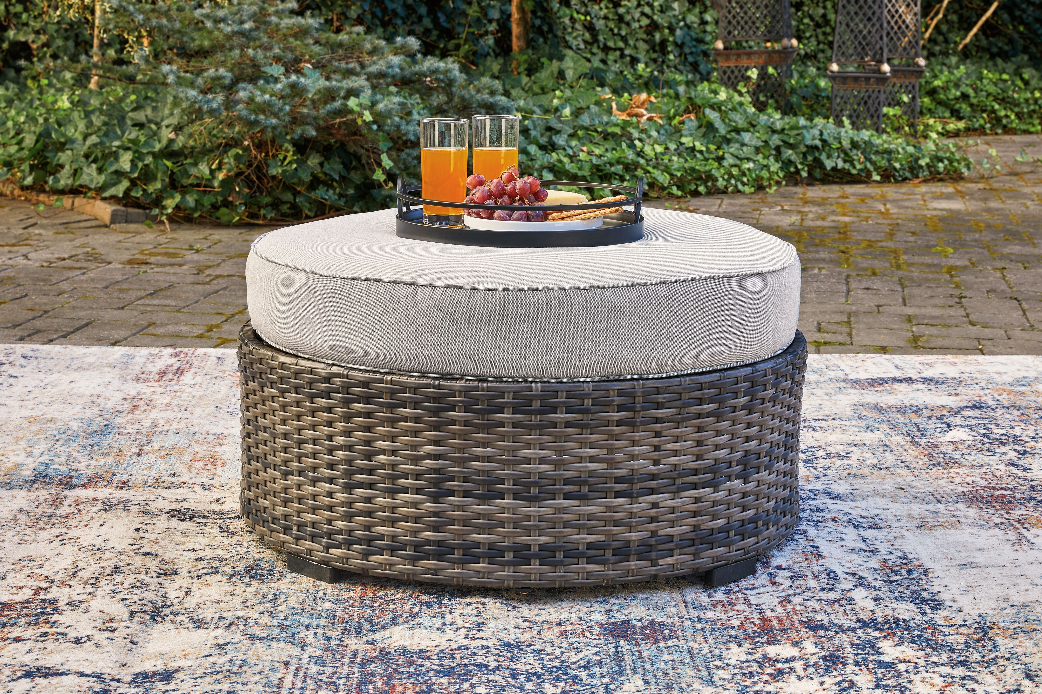 Signature Design by Ashley® Harbor Court - Gray - Ottoman With Cushion | Meri Furniture