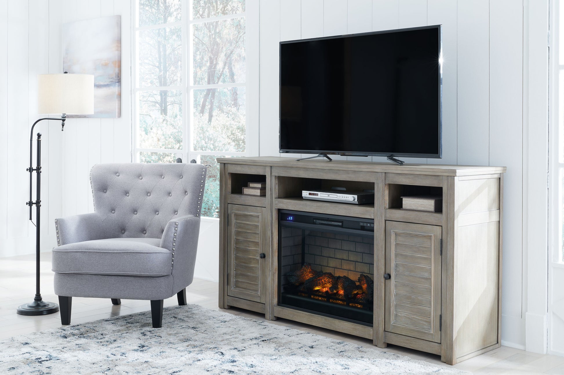Signature Design by Ashley® Moreshire - Bisque - 72" TV Stand With Electric Infrared Fireplace Insert | Meri Furniture