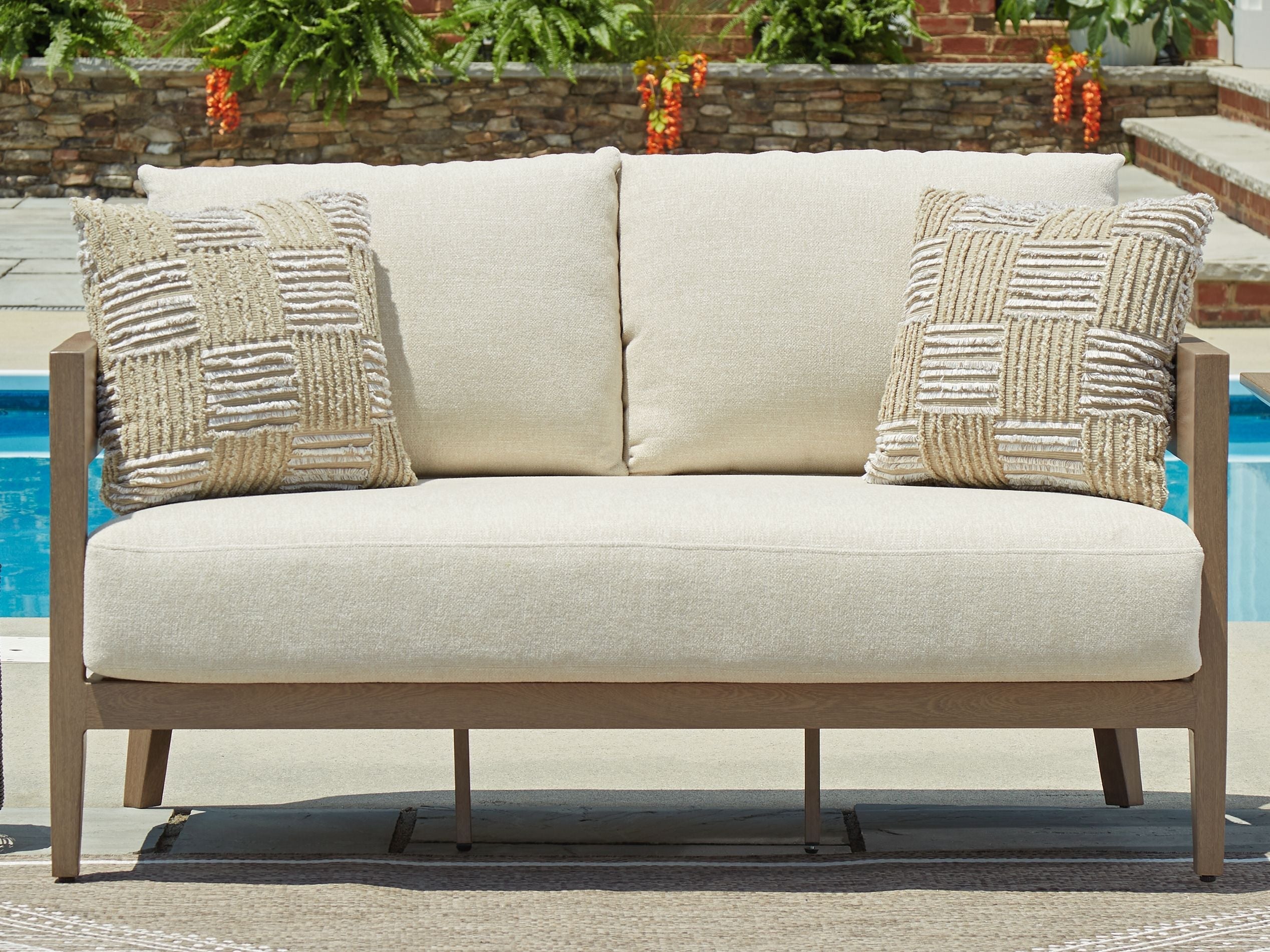 Signature Design by Ashley® Serene Bay - Dark Brown / White - Loveseat With Cushion | Meri Furniture