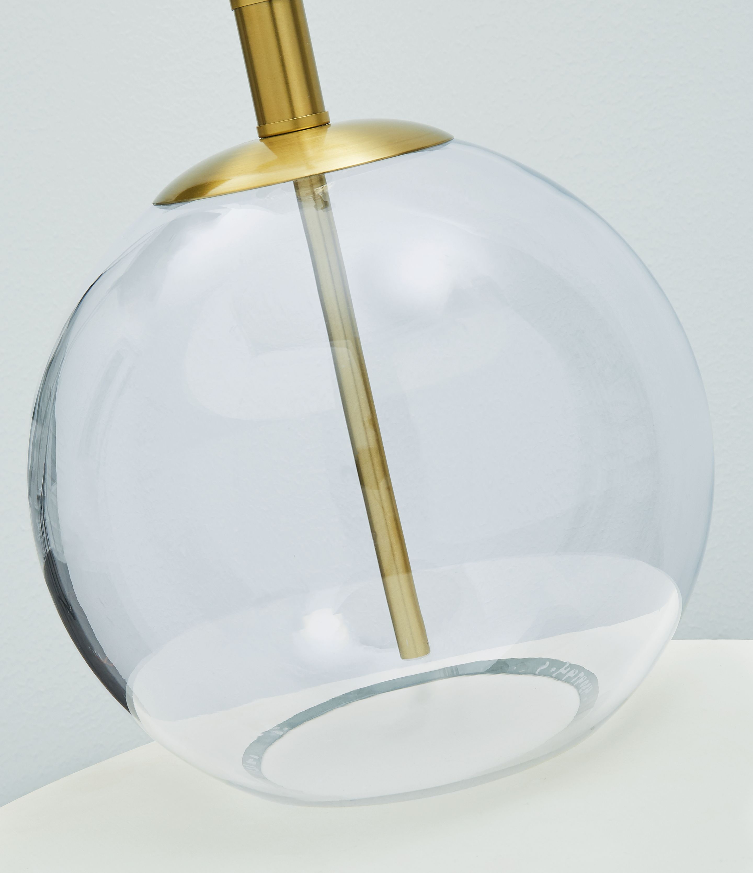Signature Design by Ashley® Samder - White - Glass Table Lamp | Meri Furniture