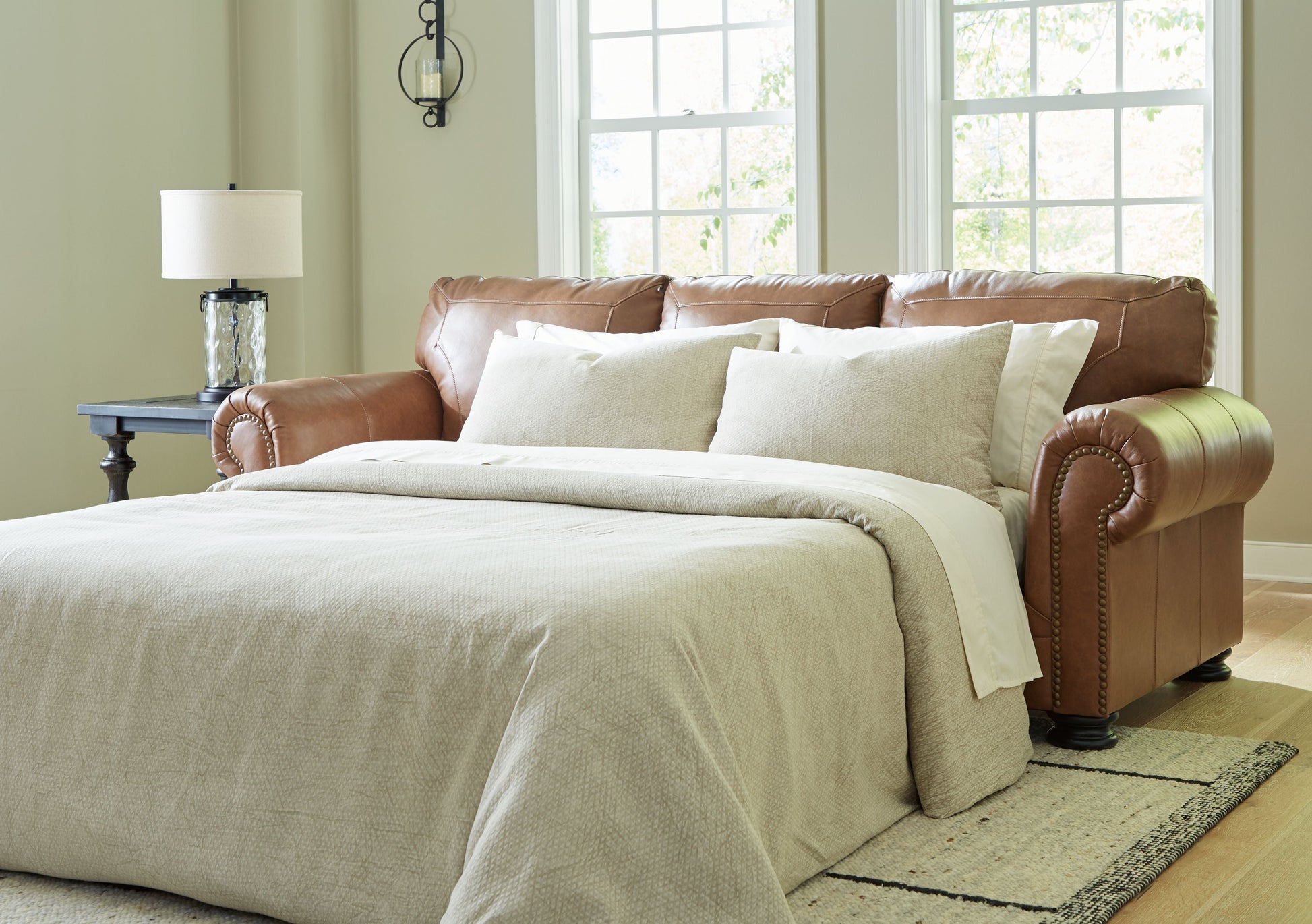 Signature Design by Ashley® Carianna - Caramel - Queen Sofa Sleeper | Meri Furniture