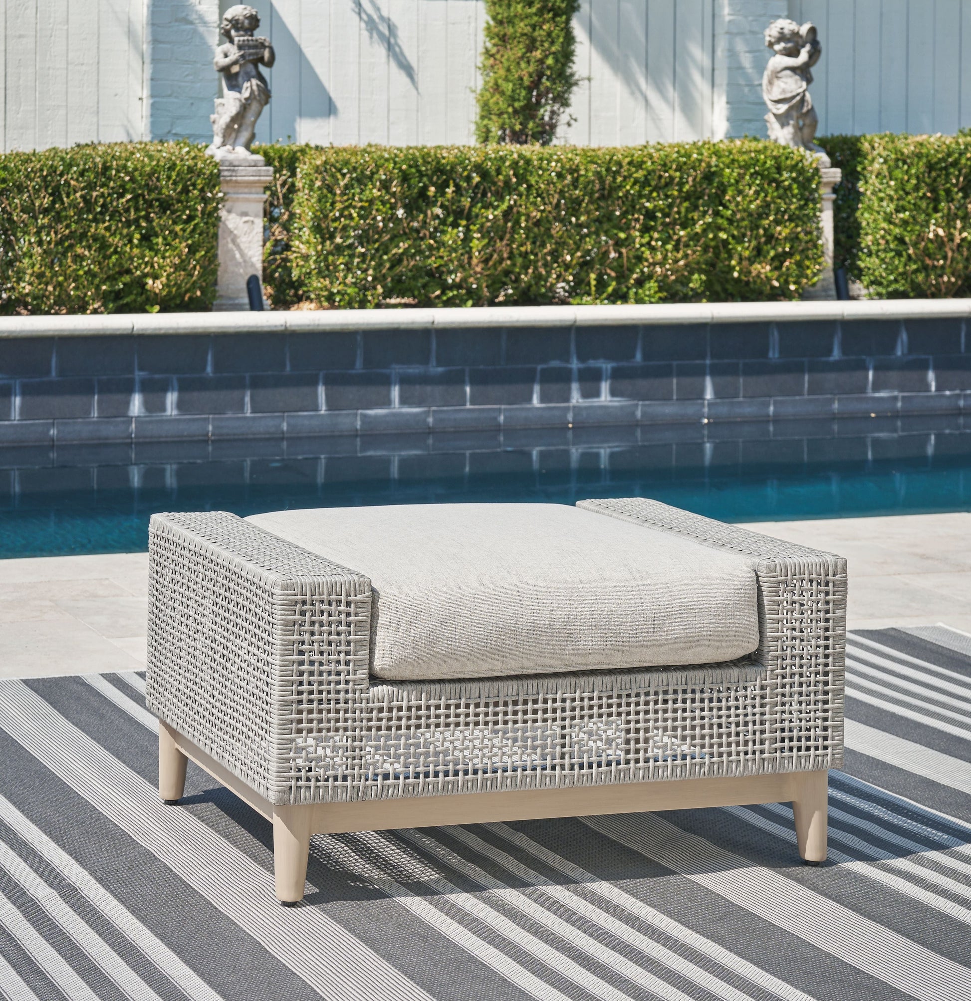 Signature Design by Ashley® Seton Creek - Gray - Ottoman With Cushion | Meri Furniture