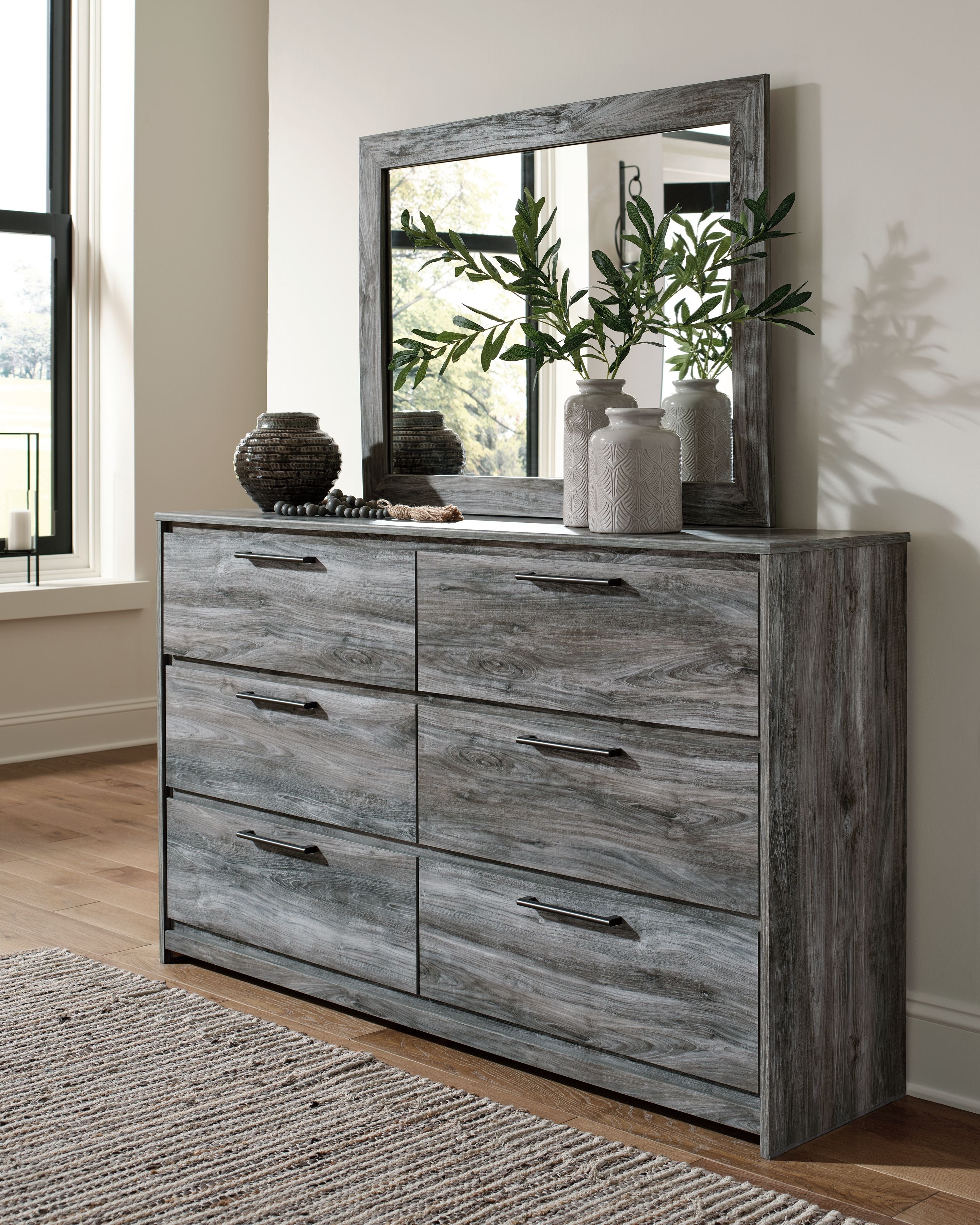 Signature Design by Ashley® Baystorm - Gray - Dresser, Dark Gray Mirror | Meri Furniture
