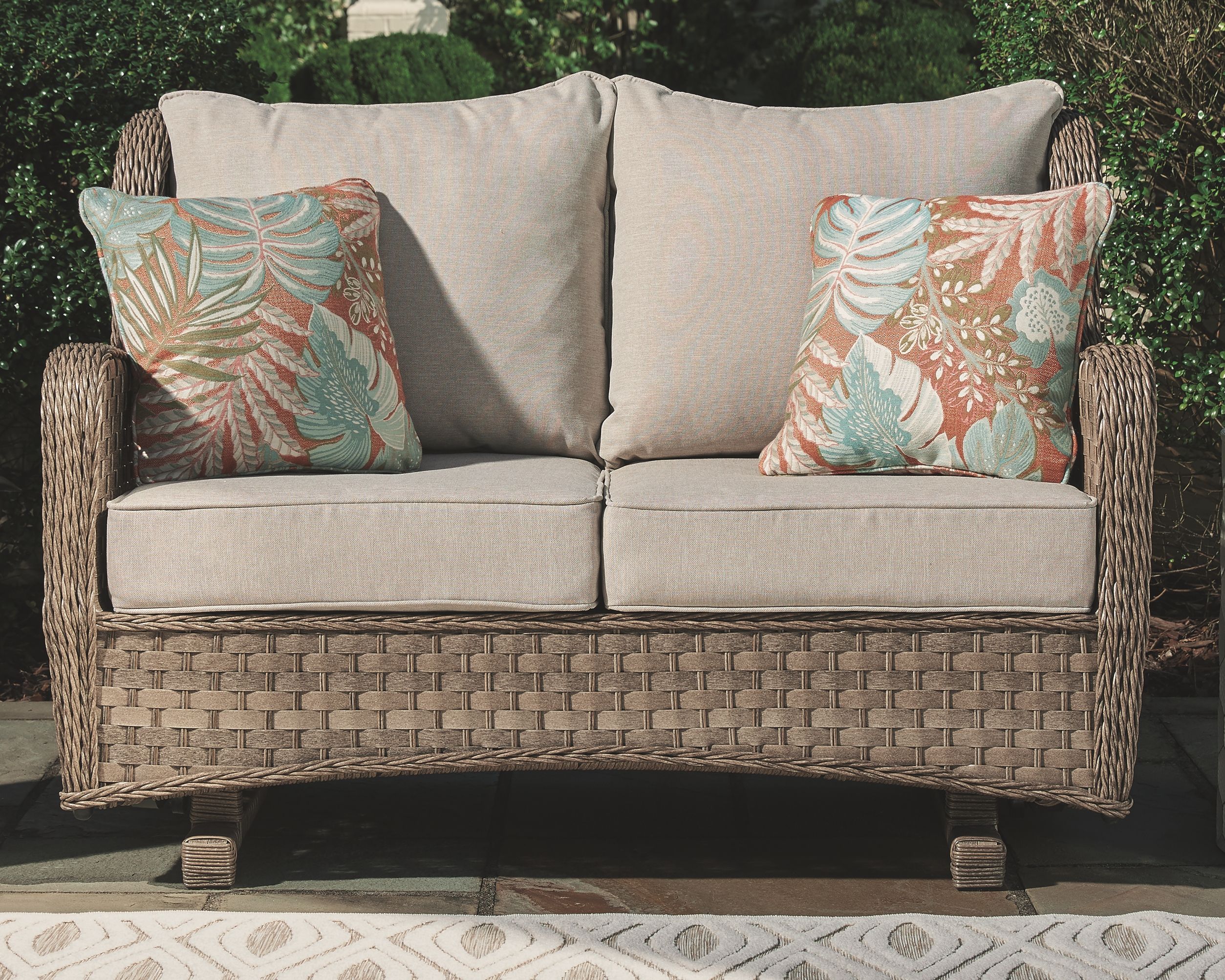 Signature Design by Ashley® Clear Ridge - Light Brown - Loveseat Glider W/Cushion | Meri Furniture
