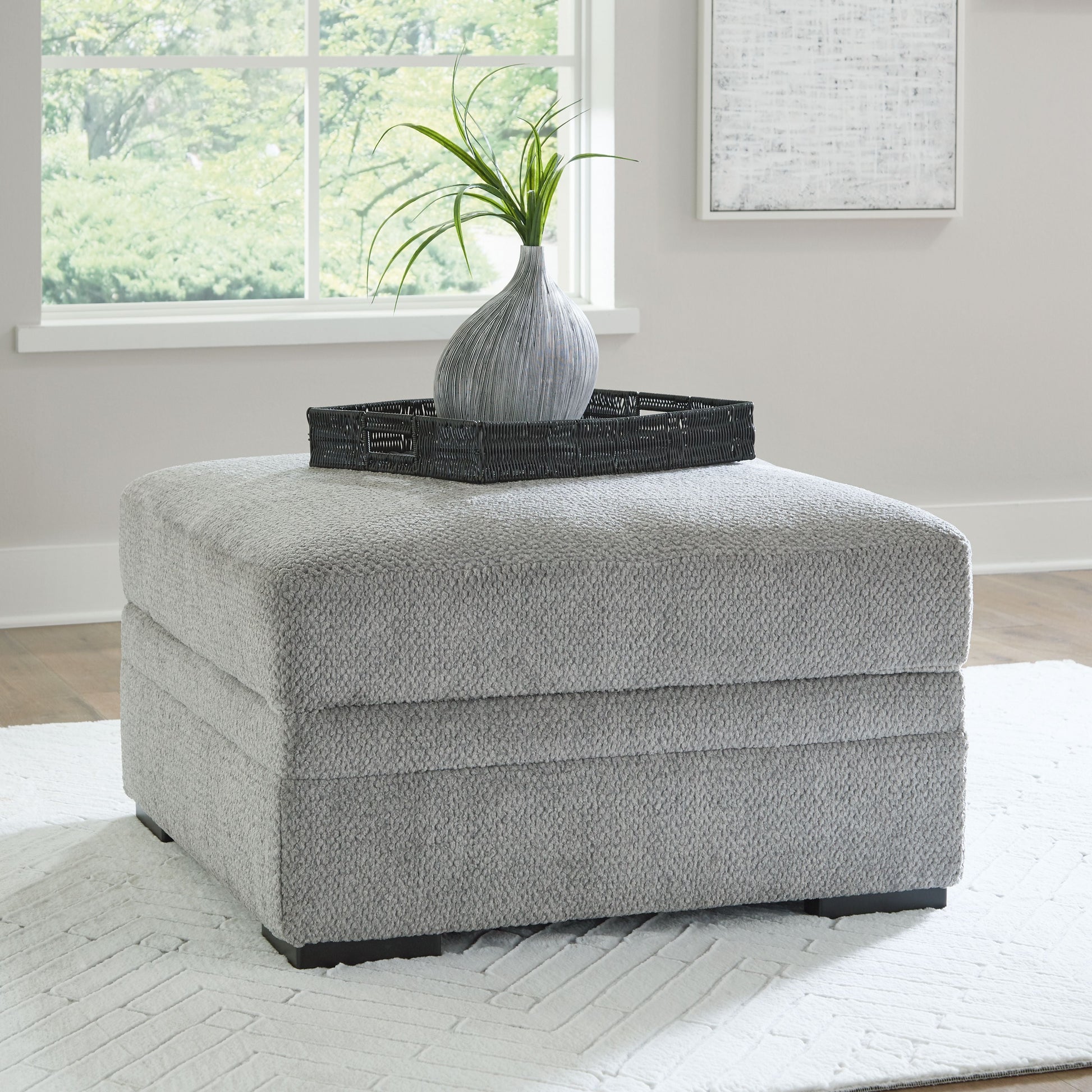 Signature Design by Ashley® Casselbury - Cement - Ottoman With Storage | Meri Furniture