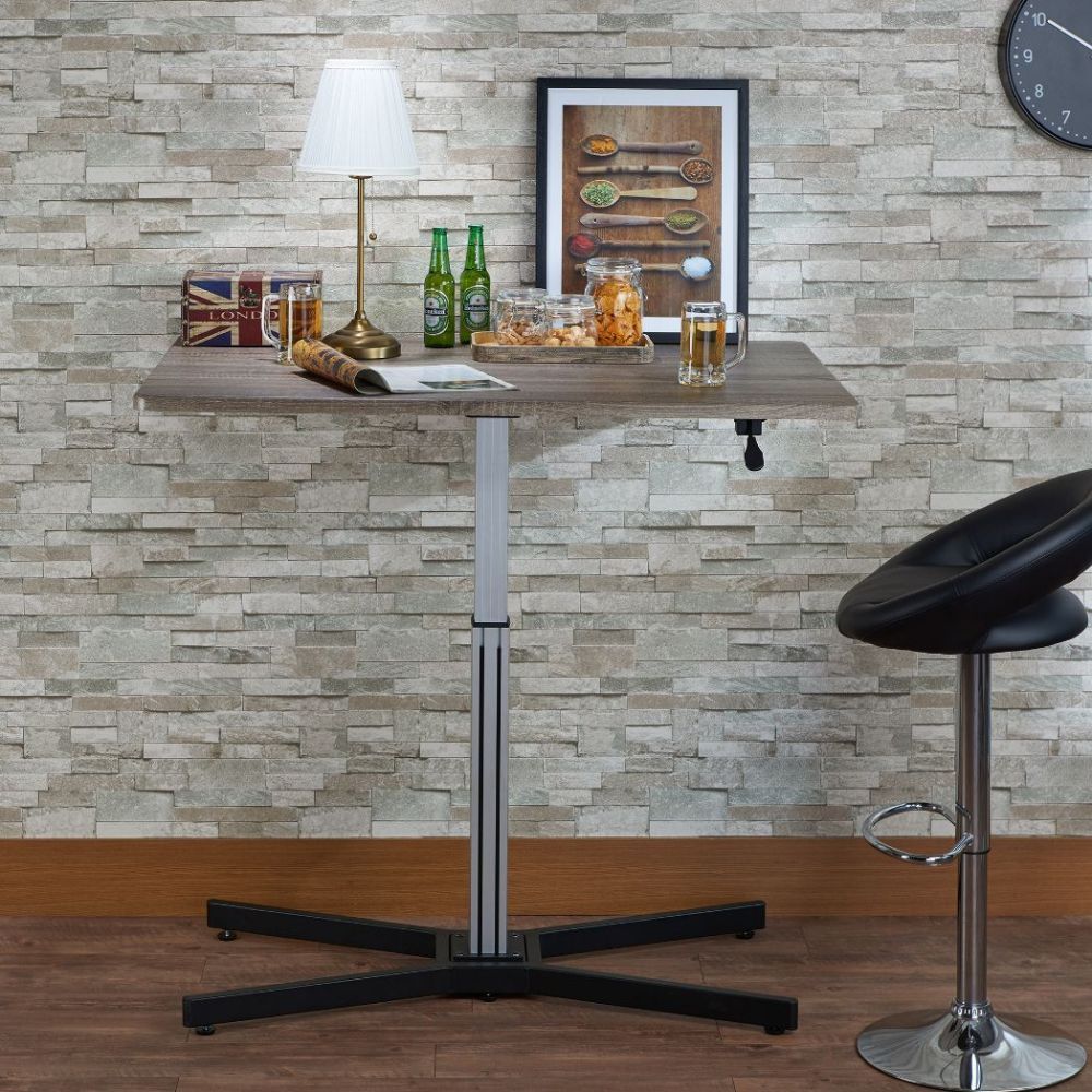 ACME Take a break and get out of the chair once in a while with the adjustable Inscho lift desk. The sturdy base and the large table top allow for plenty of room for working in both sitting or standing positions. | Meri Furniture