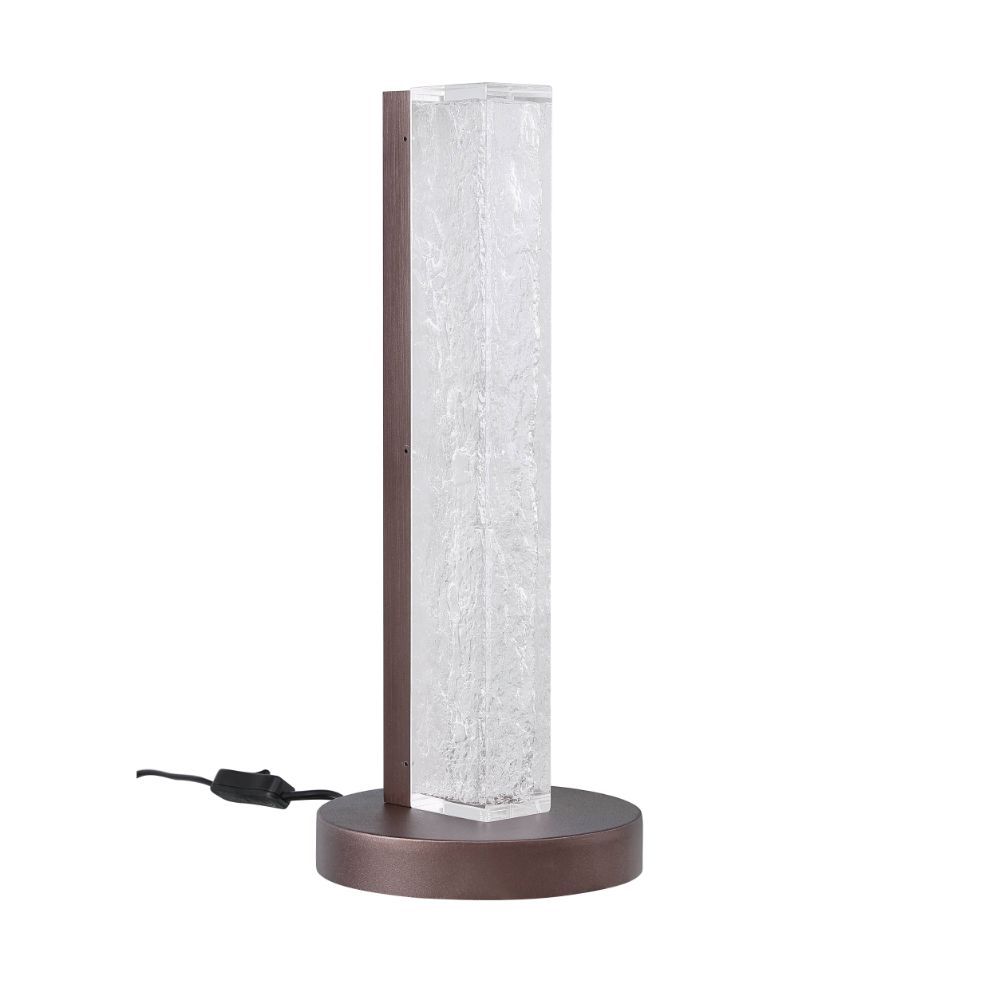 ACME Both a source of light and a beautiful accent piece, this clear resin lamp is not to be missed. The rectangular resin block of the lamp body leans modern, while the sleek finish of the metal base lends glamour to the overall design of this unique lam