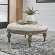 Liberty Furniture Americana Farmhouse - Round Cocktail Ottoman - Light Brown | Meri Furniture