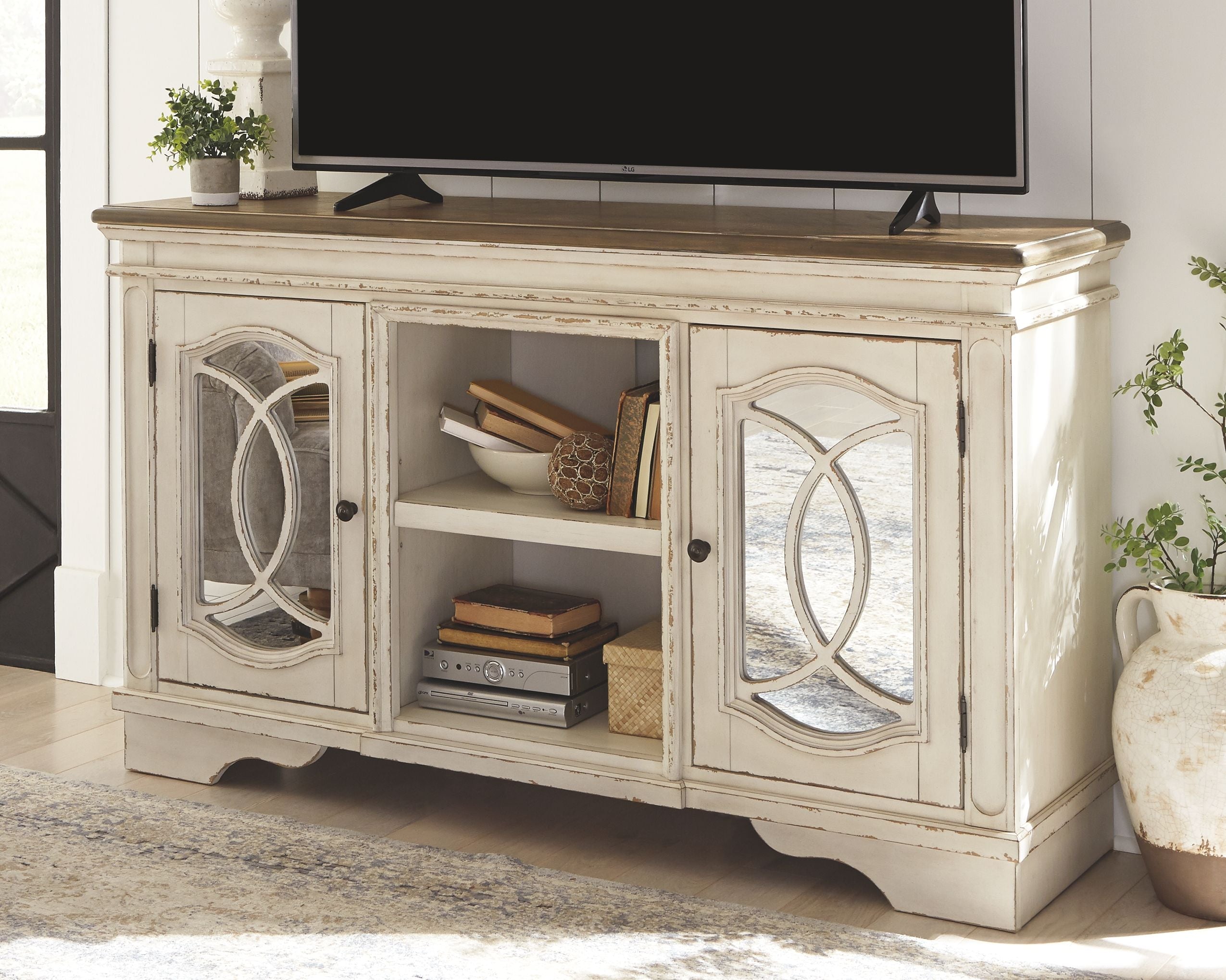 Ashley Furniture Realyn - TV Stand | Meri Furniture