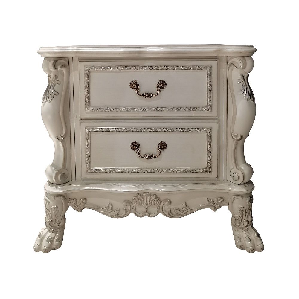 The Dresden Nightstand offers beautiful craftsmanship and artistic carvings. It features solid hardwood with two drawers for storage with coordinating carvings. The drawers feature dove tail construction and are decorated with antique brass hardware.