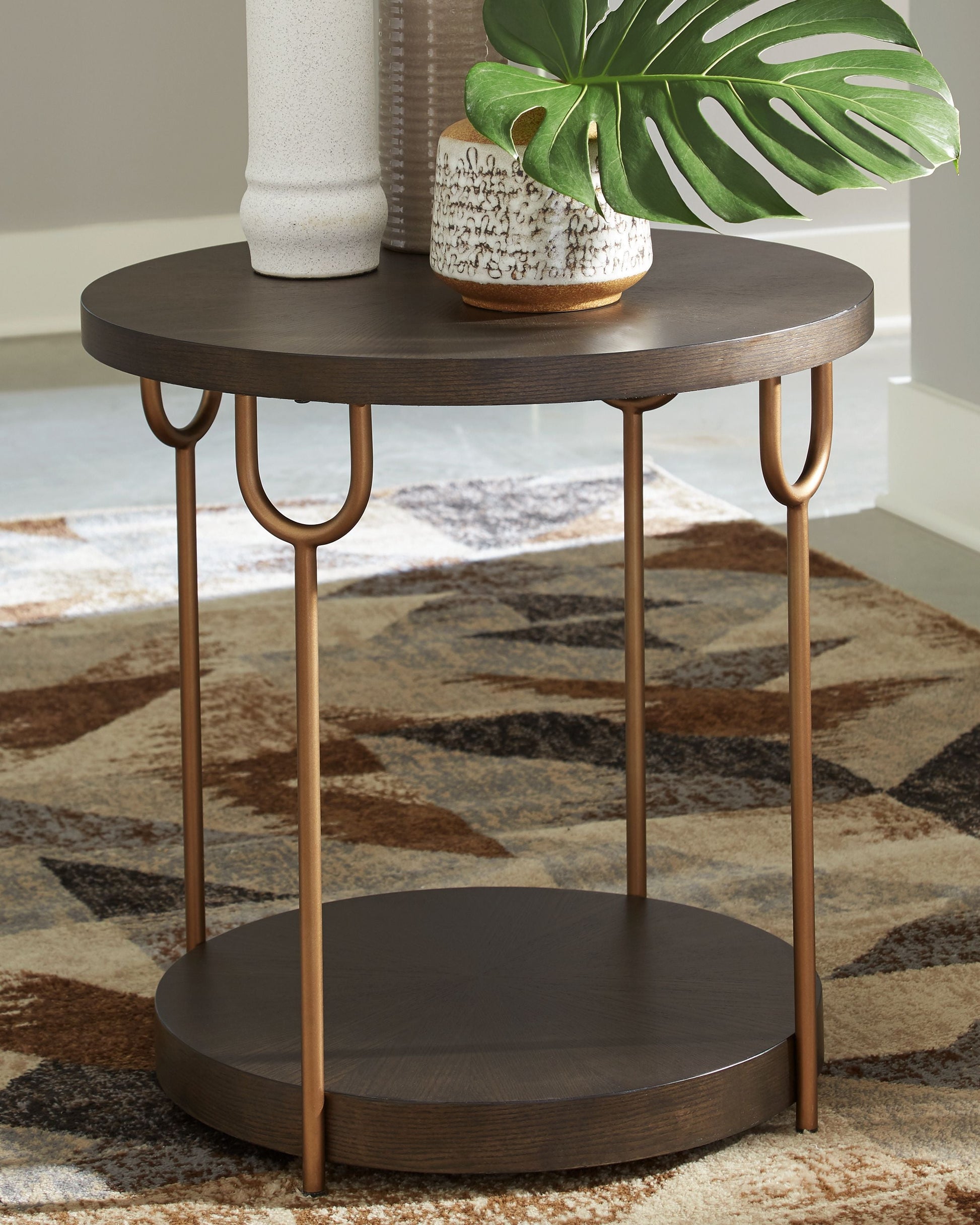 Signature Design by Ashley® Brazburn - Dark Brown / Gold Finish - Round End Table | Meri Furniture
