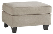 Ashley Furniture Abney - Driftwood - Ottoman | Meri Furniture