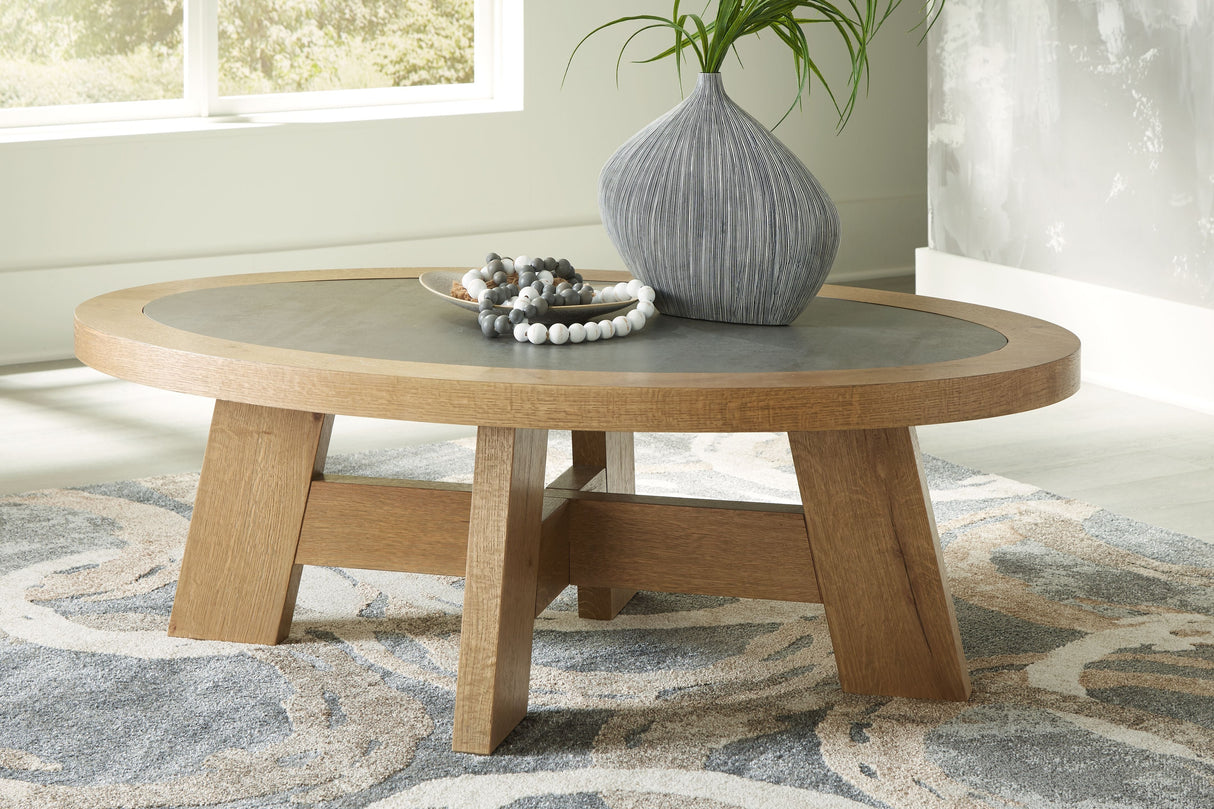 Signature Design by Ashley® Brinstead - Light Brown - Oval Cocktail Table | Meri Furniture