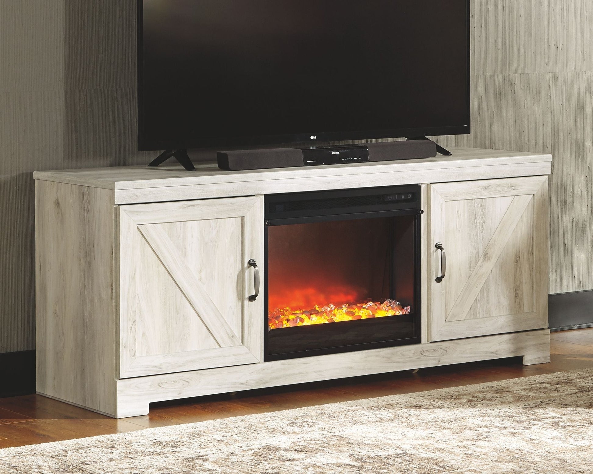 Signature Design by Ashley® Bellaby - Entertainment Center | Meri Furniture