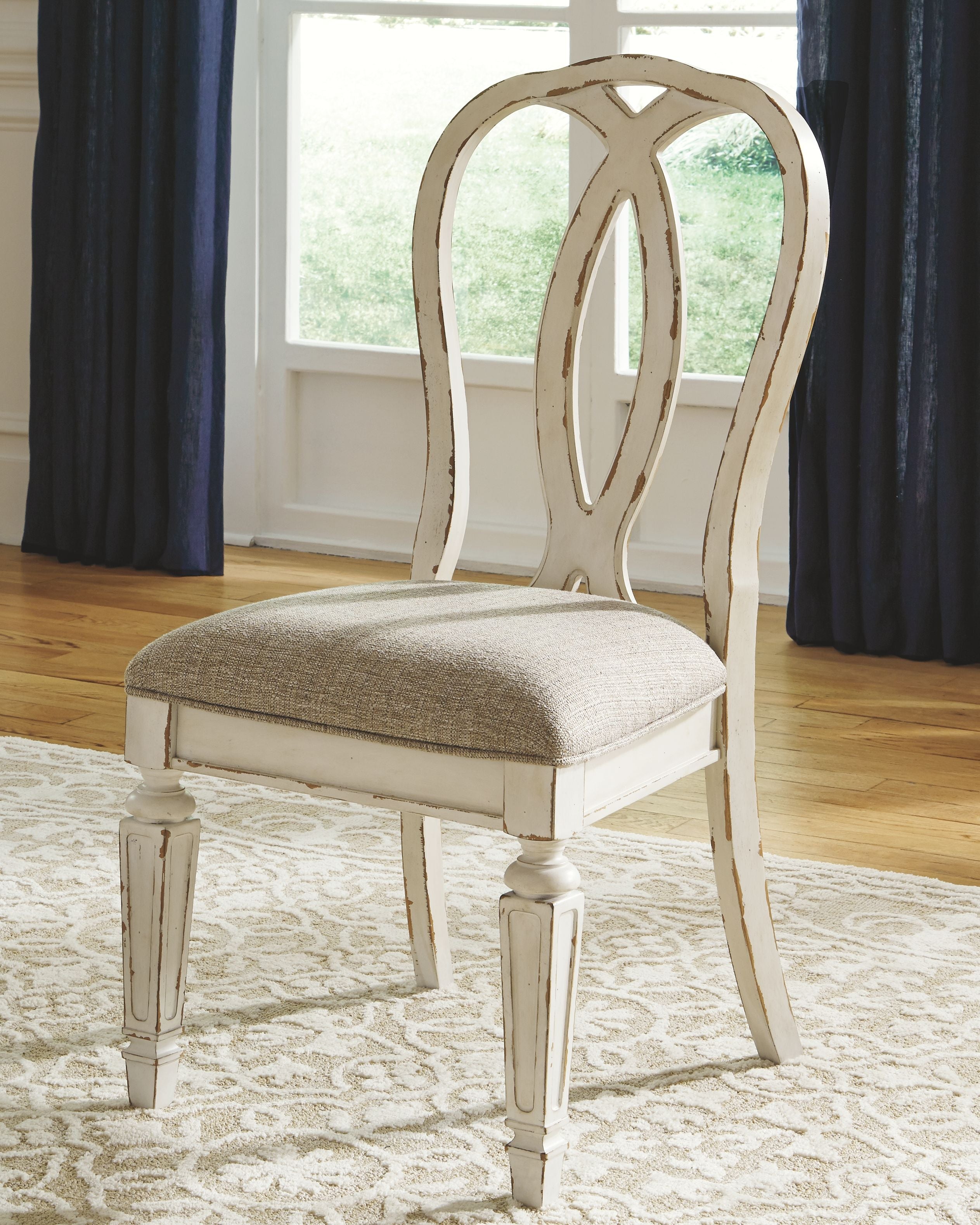 Signature Design by Ashley® Realyn - Oval Dining Table Set | Meri Furniture